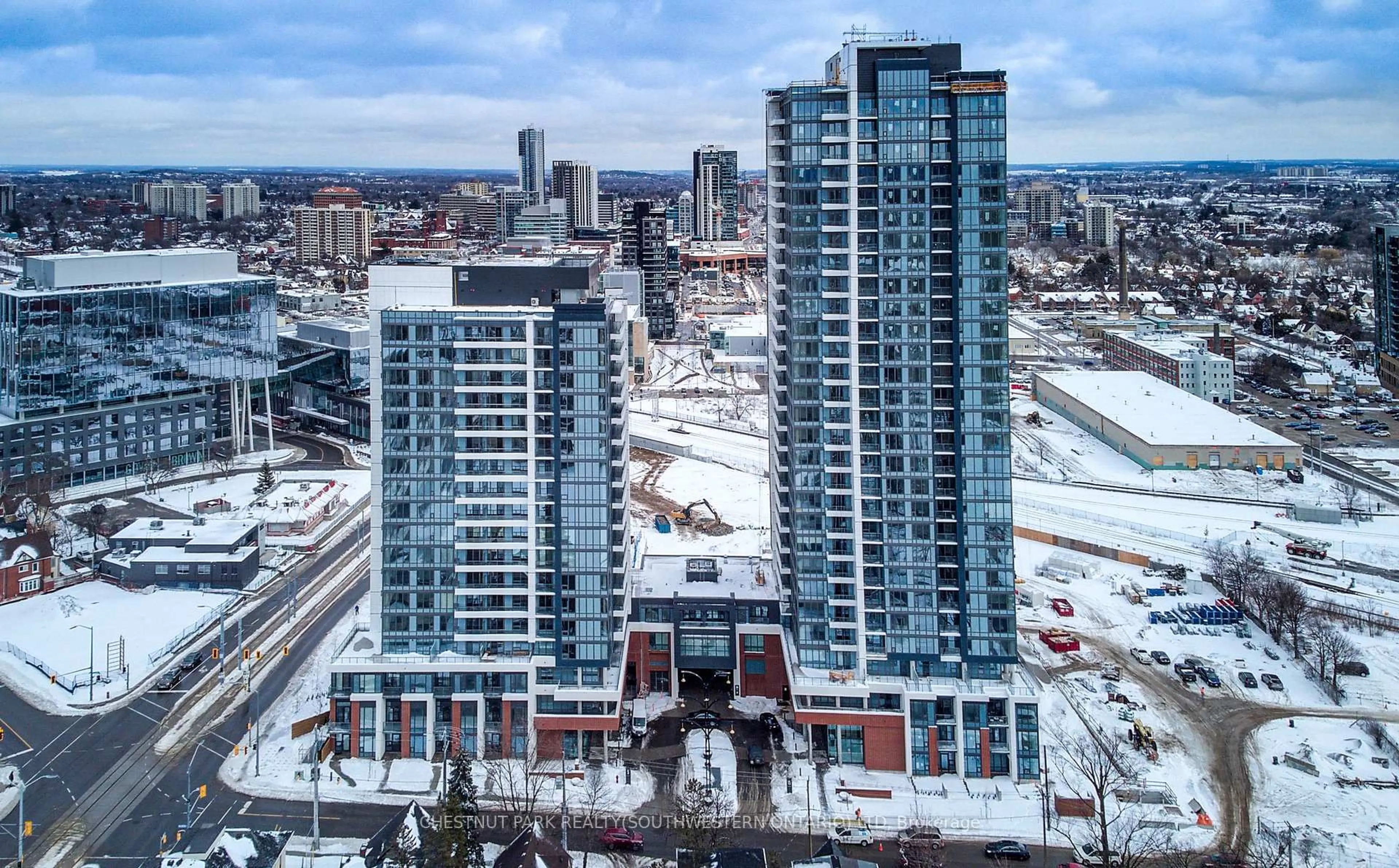 A pic from outside/outdoor area/front of a property/back of a property/a pic from drone, city buildings view from balcony for 15 Wellington St #1704, Kitchener Ontario N2G 0E4