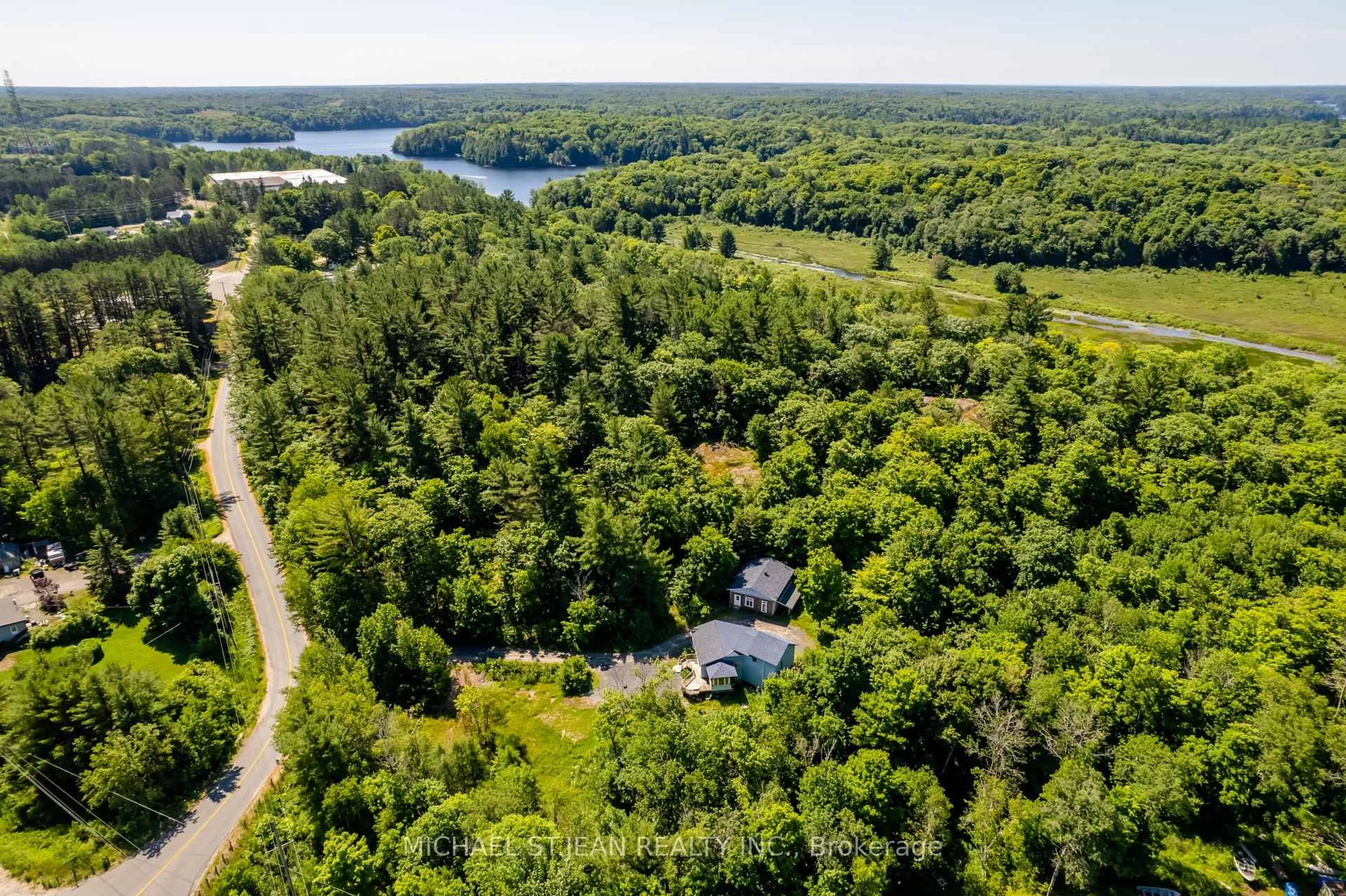 A pic from outside/outdoor area/front of a property/back of a property/a pic from drone, water/lake/river/ocean view for 3 Rankin Lk Rd, Seguin Ontario P2A 0B2