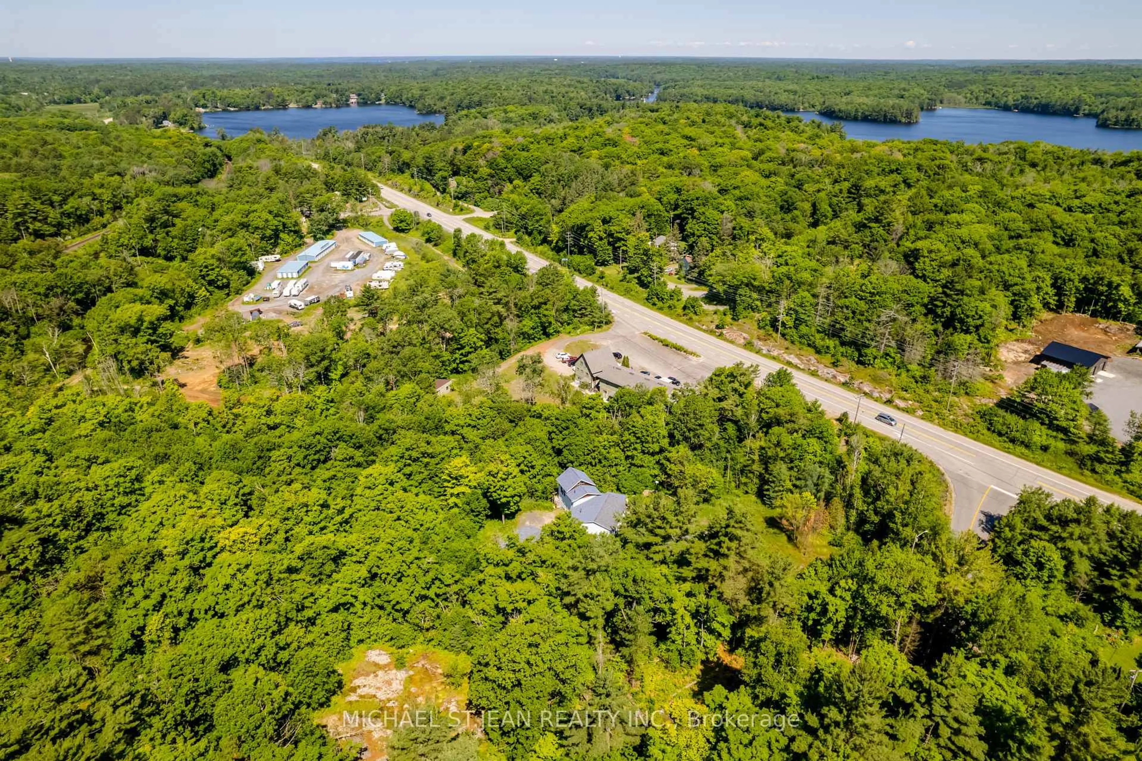 A pic from outside/outdoor area/front of a property/back of a property/a pic from drone, water/lake/river/ocean view for 3 Rankin Lk Rd, Seguin Ontario P2A 0B2