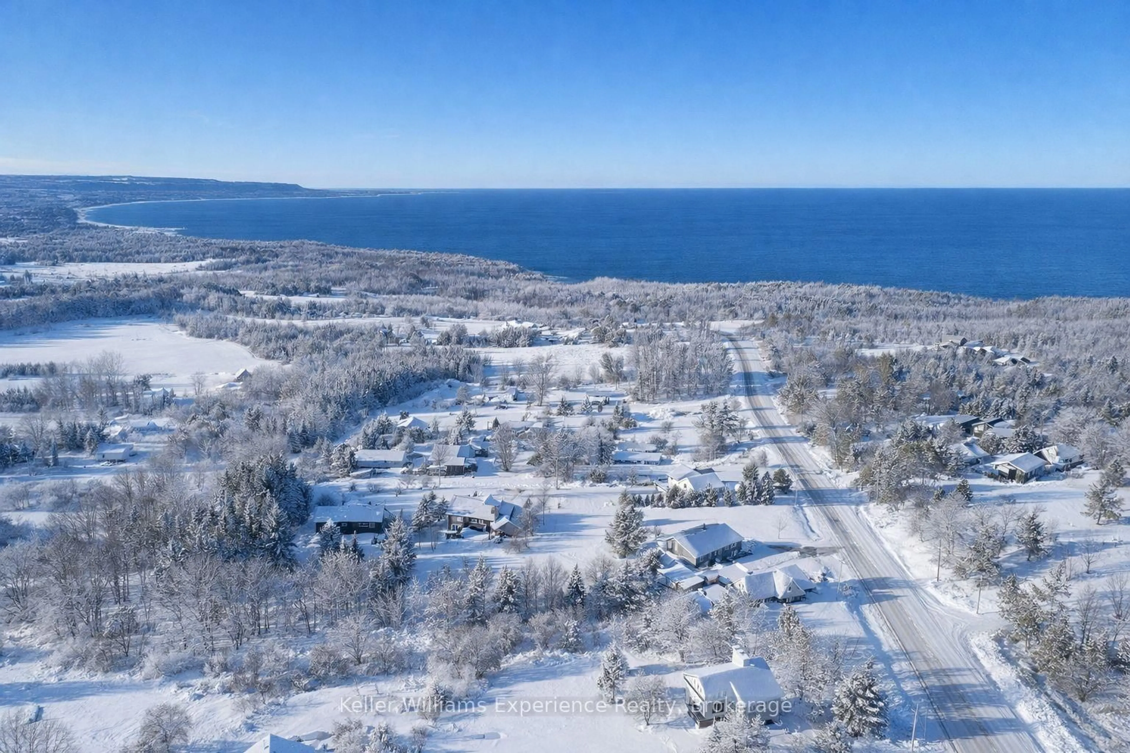 A pic from outside/outdoor area/front of a property/back of a property/a pic from drone, water/lake/river/ocean view for 317557 3rd Line, Meaford Ontario N4L 1W7