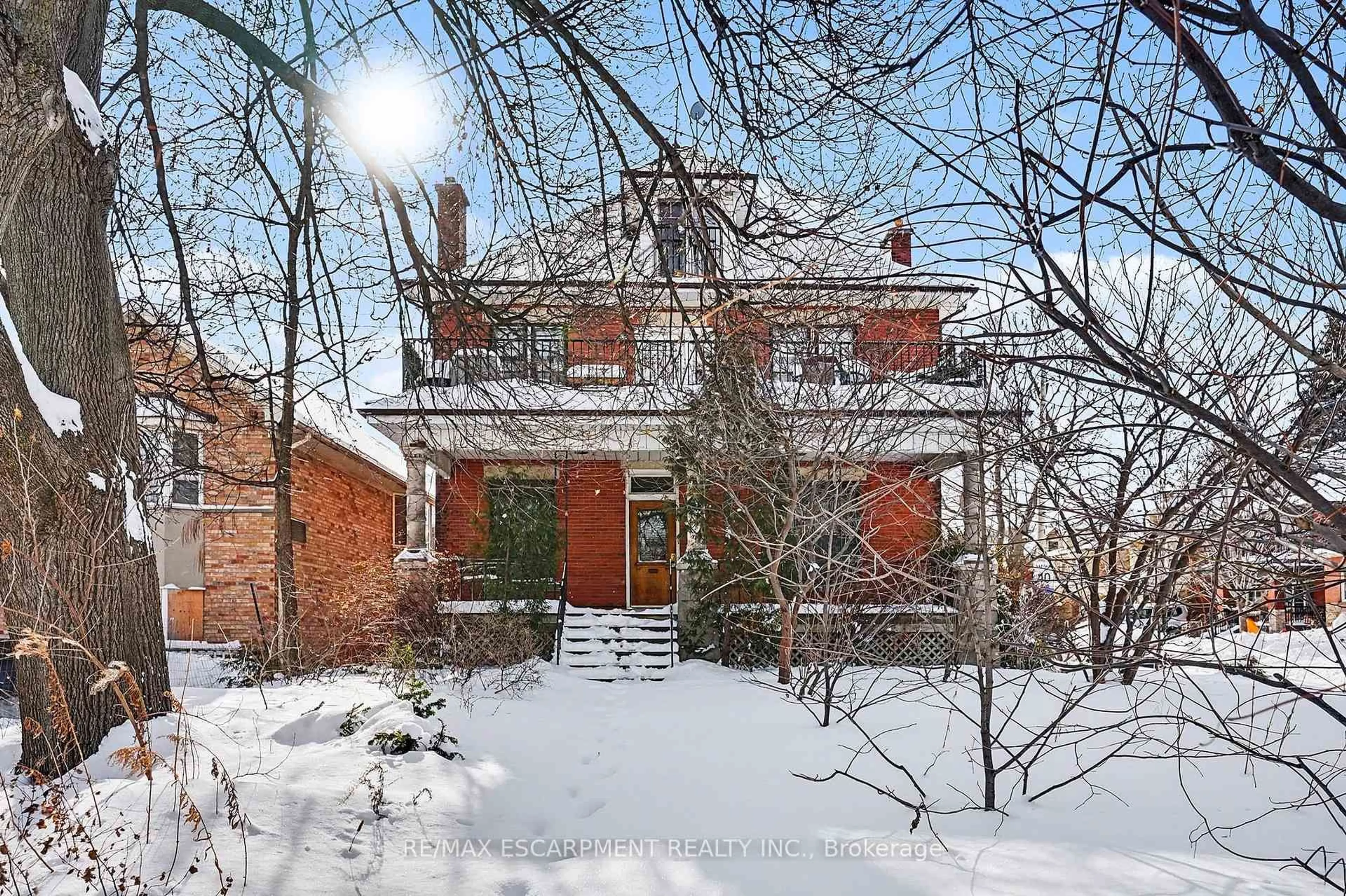 Home with brick exterior material, street for 1316 King St, Hamilton Ontario L8M 1H3