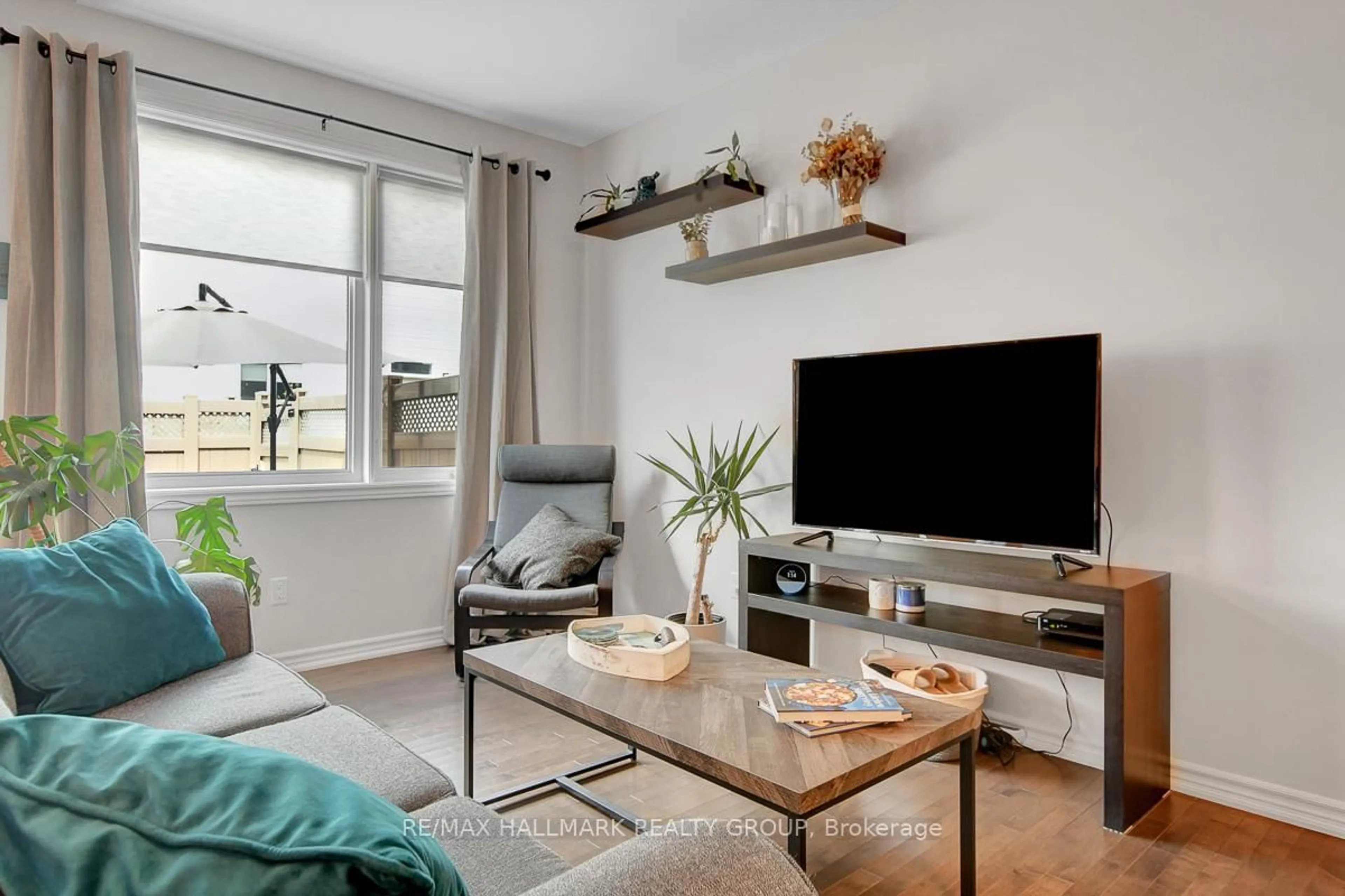 Living room with furniture, unknown for 14 Darvoy Mews, Ottawa Ontario K1W 0M6