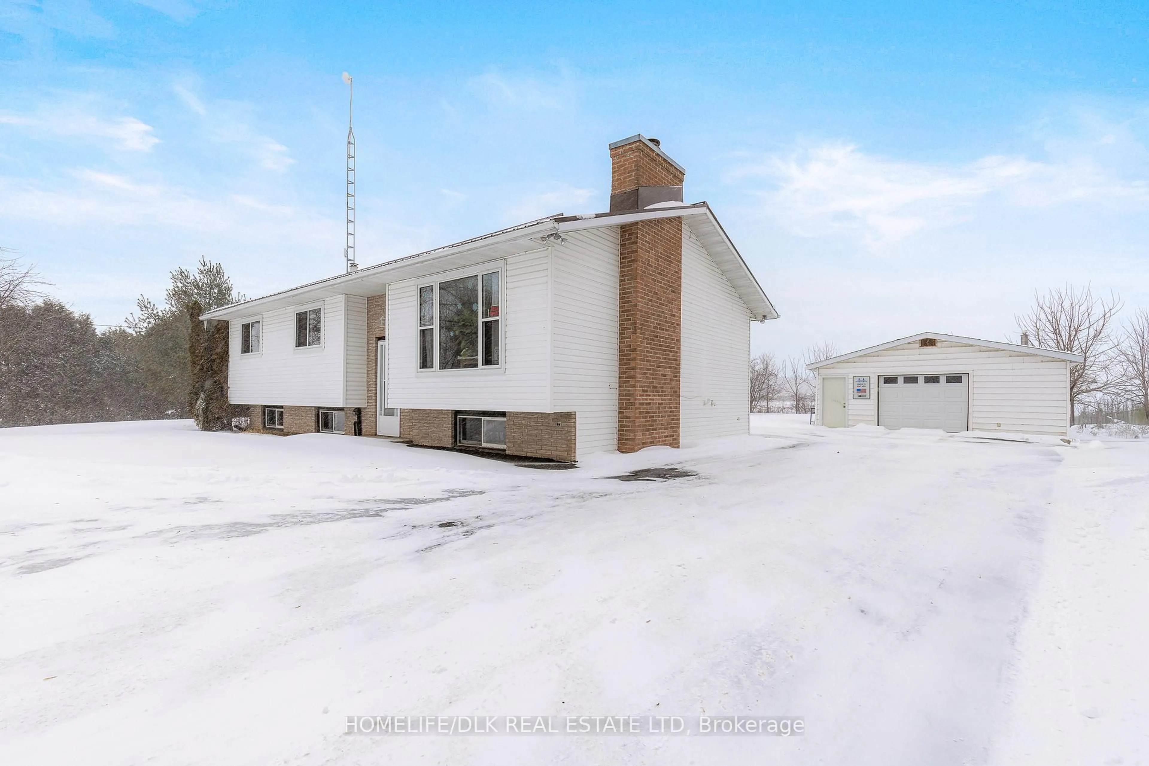 A pic from outside/outdoor area/front of a property/back of a property/a pic from drone, street for 2106 County 2 Rd, Edwardsburgh/Cardinal Ontario K0E 1T1