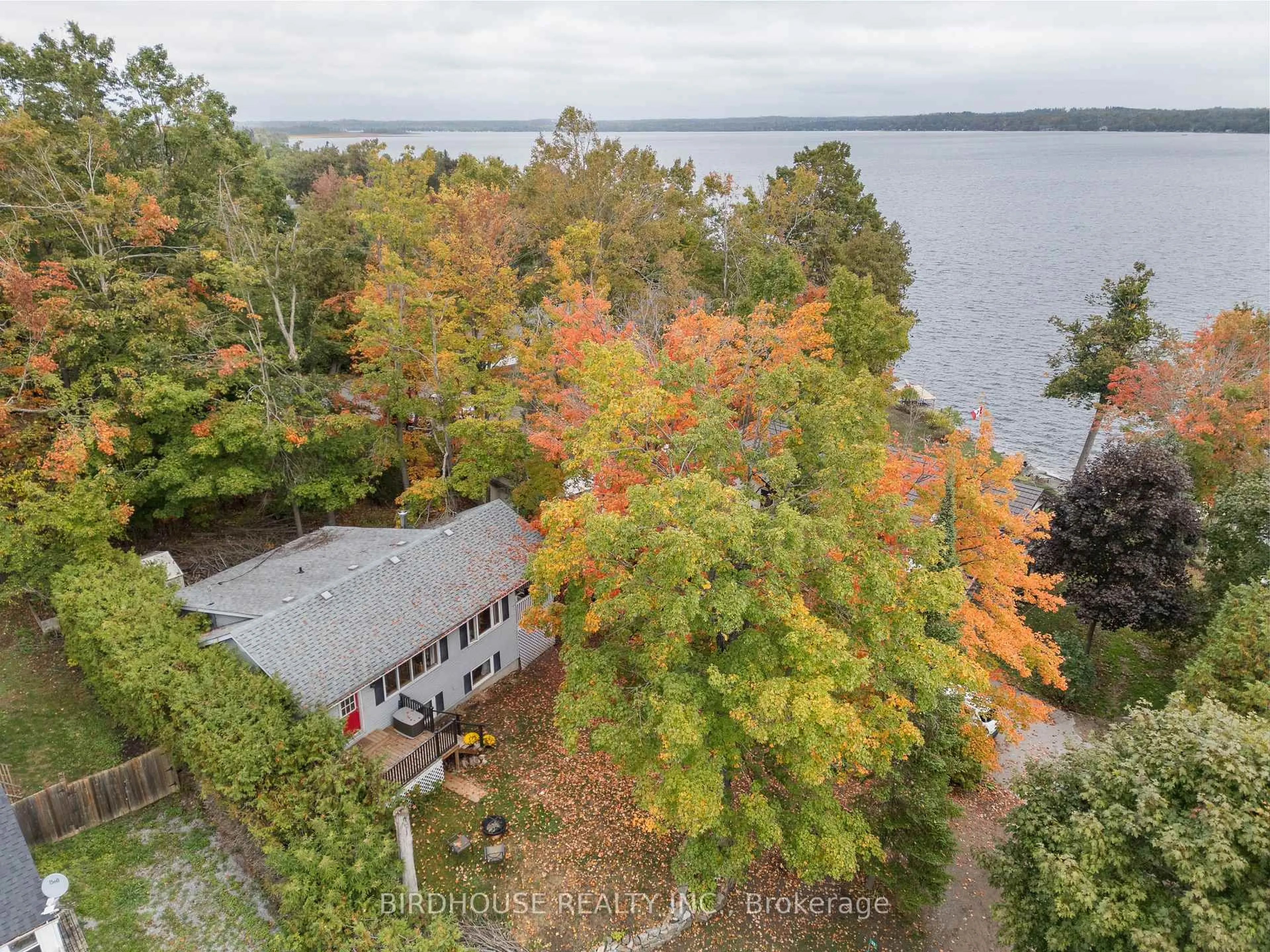 A pic from outside/outdoor area/front of a property/back of a property/a pic from drone, water/lake/river/ocean view for 23 Pleasure St, Kawartha Lakes Ontario K0M 1G0