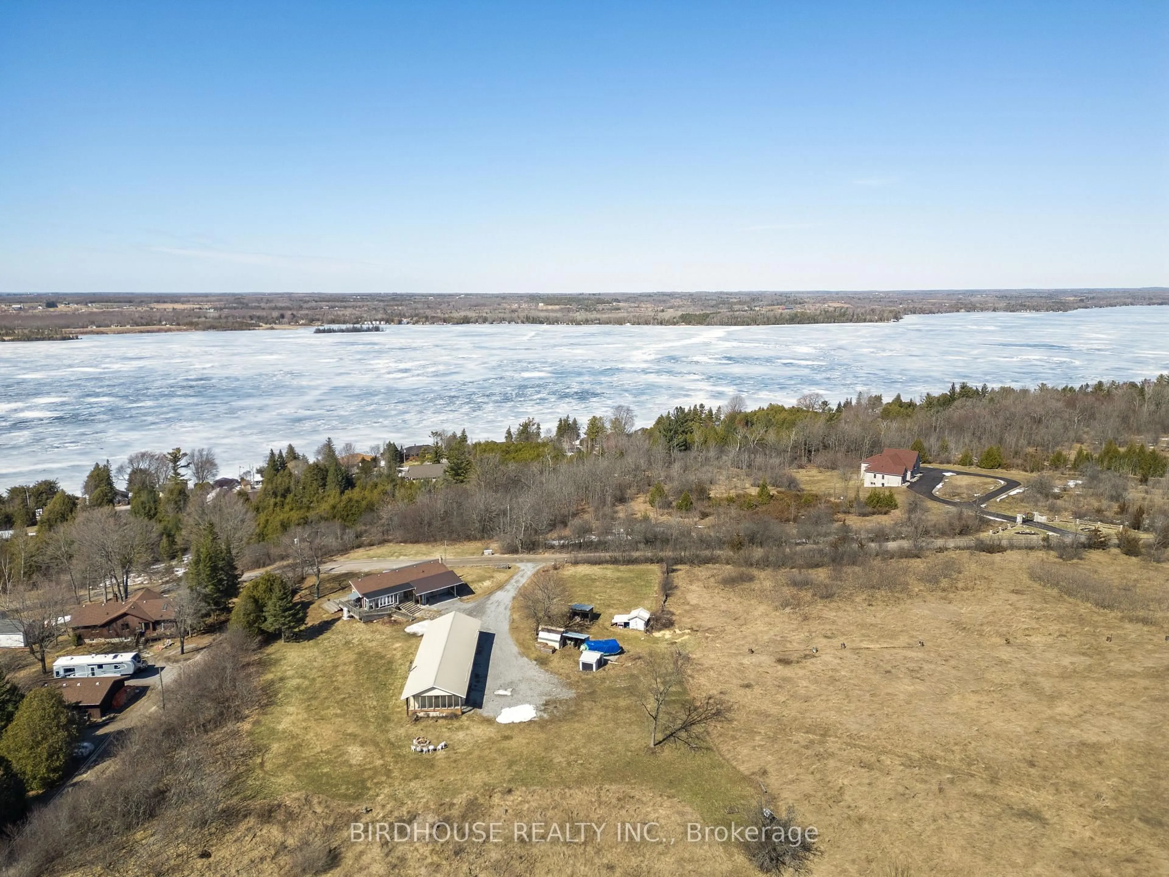 A pic from outside/outdoor area/front of a property/back of a property/a pic from drone, water/lake/river/ocean view for 53 Maple Grove Rd, Kawartha Lakes Ontario K0M 1L0