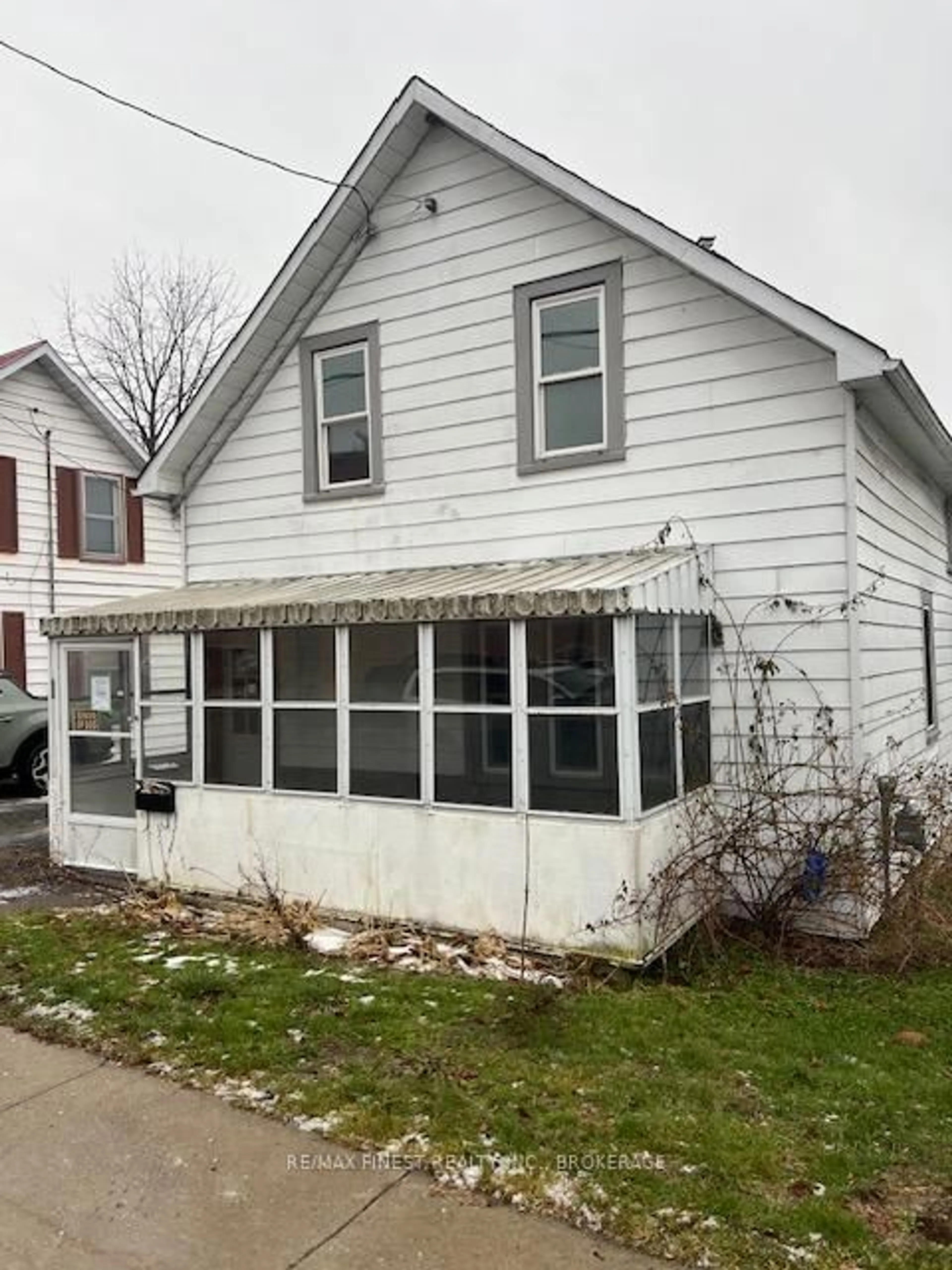 Home with vinyl exterior material, street for 24 Mill St, Greater Napanee Ontario K7R 1X4