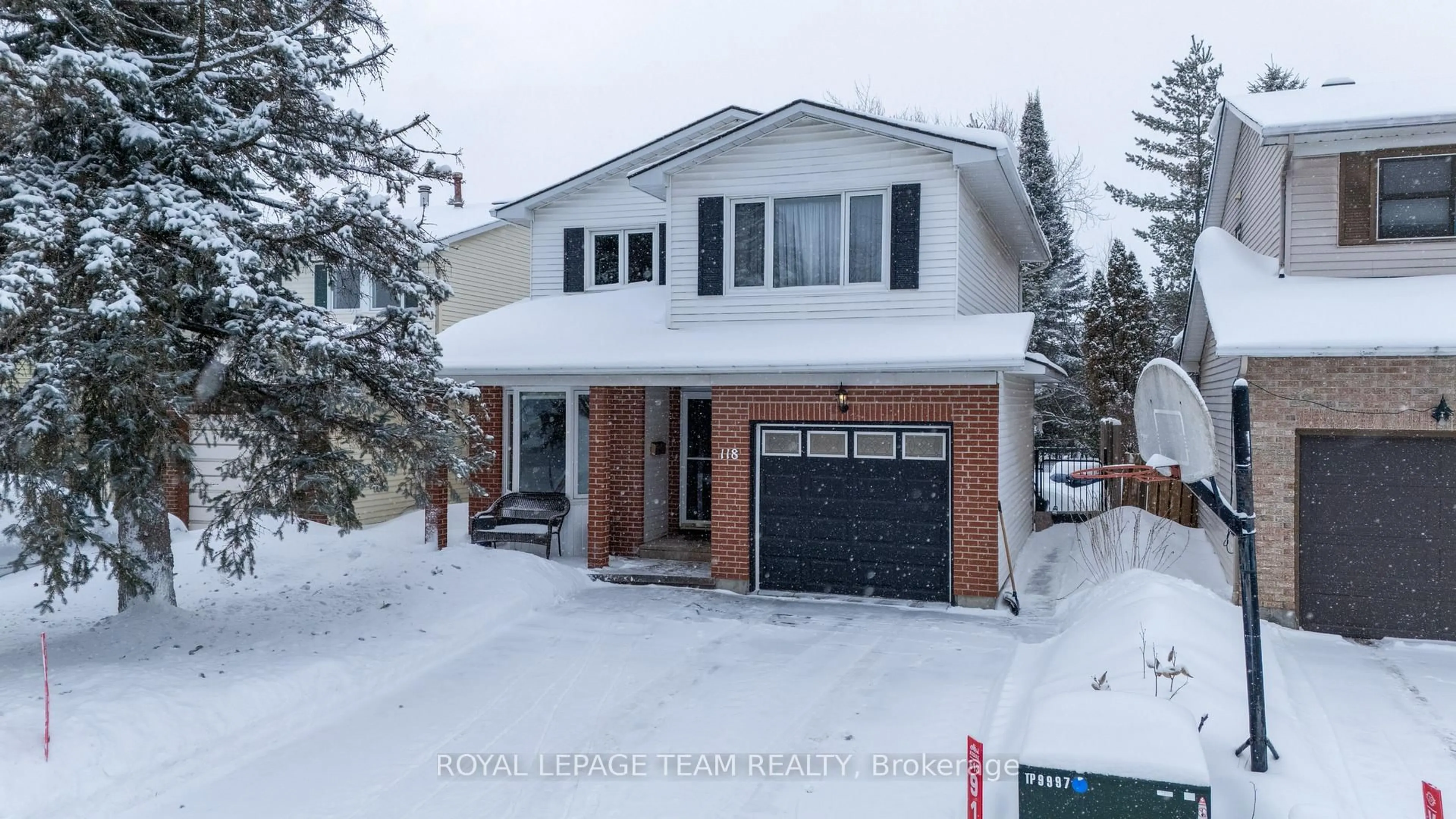 Home with brick exterior material, street for 118 Seabrooke Dr, Kanata Ontario K2L 2R4
