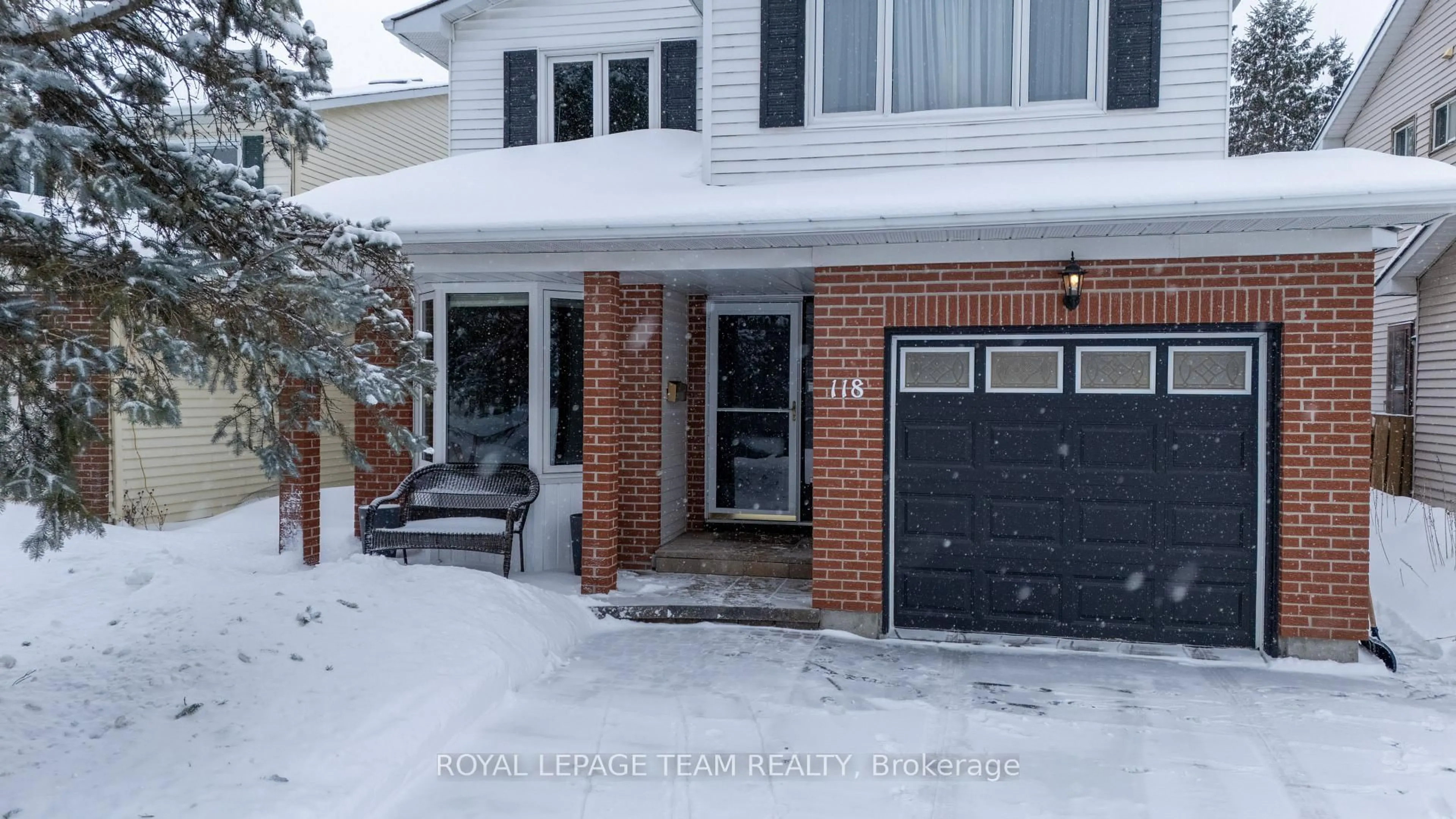 Home with brick exterior material, street for 118 Seabrooke Dr, Kanata Ontario K2L 2R4