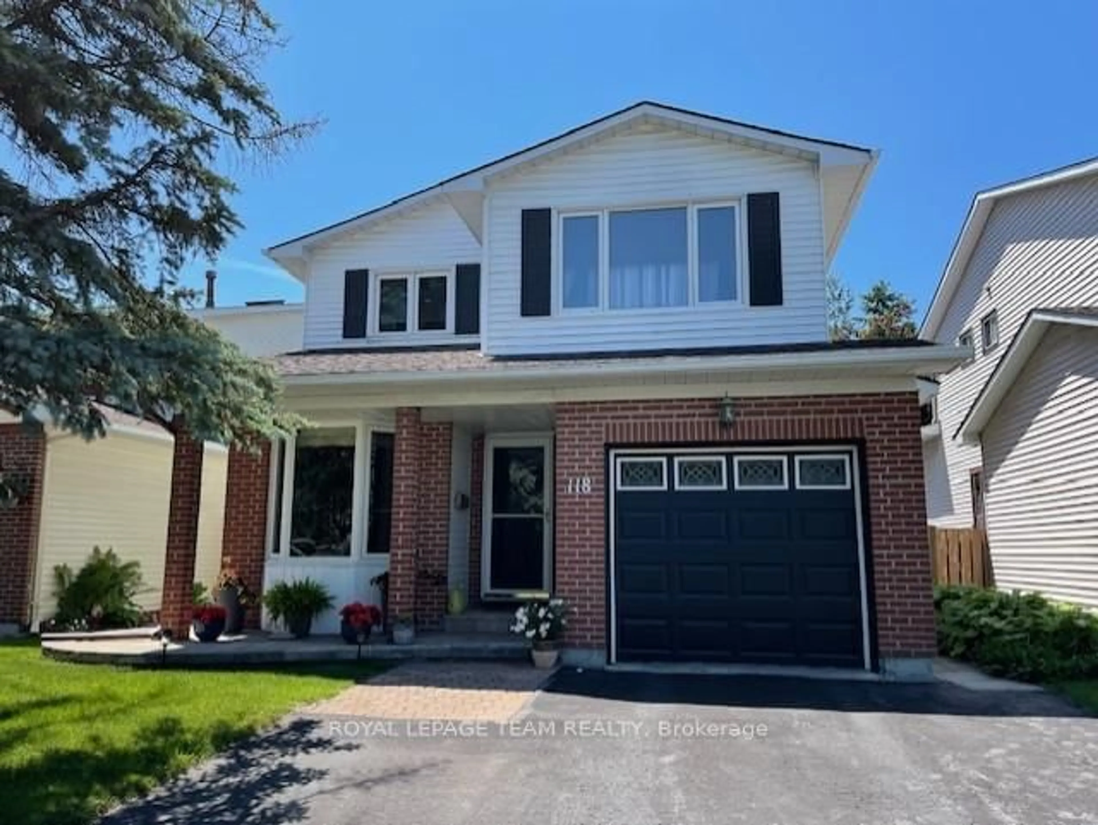 Home with brick exterior material, street for 118 Seabrooke Dr, Kanata Ontario K2L 2R4