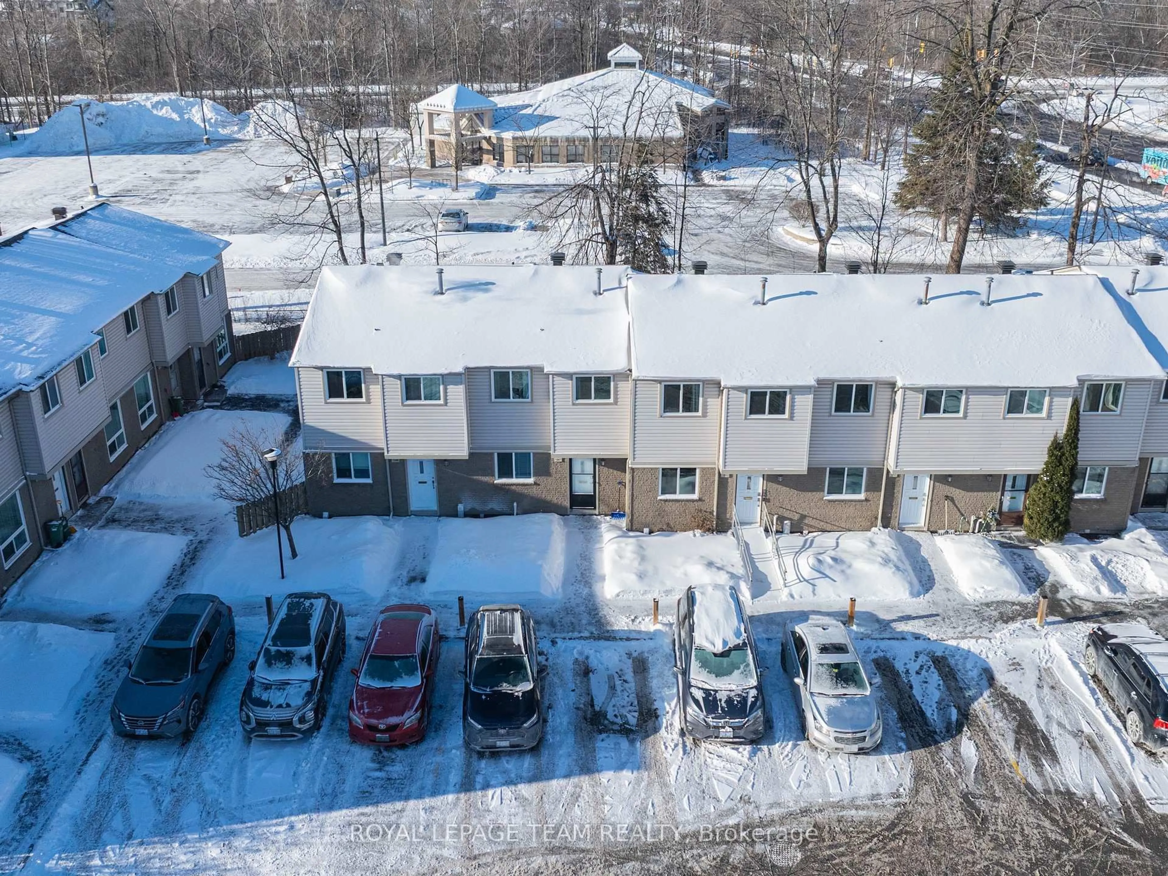 A pic from outside/outdoor area/front of a property/back of a property/a pic from drone, street for 1347 Perez Cres #67, Ottawa Ontario K1J 8T9