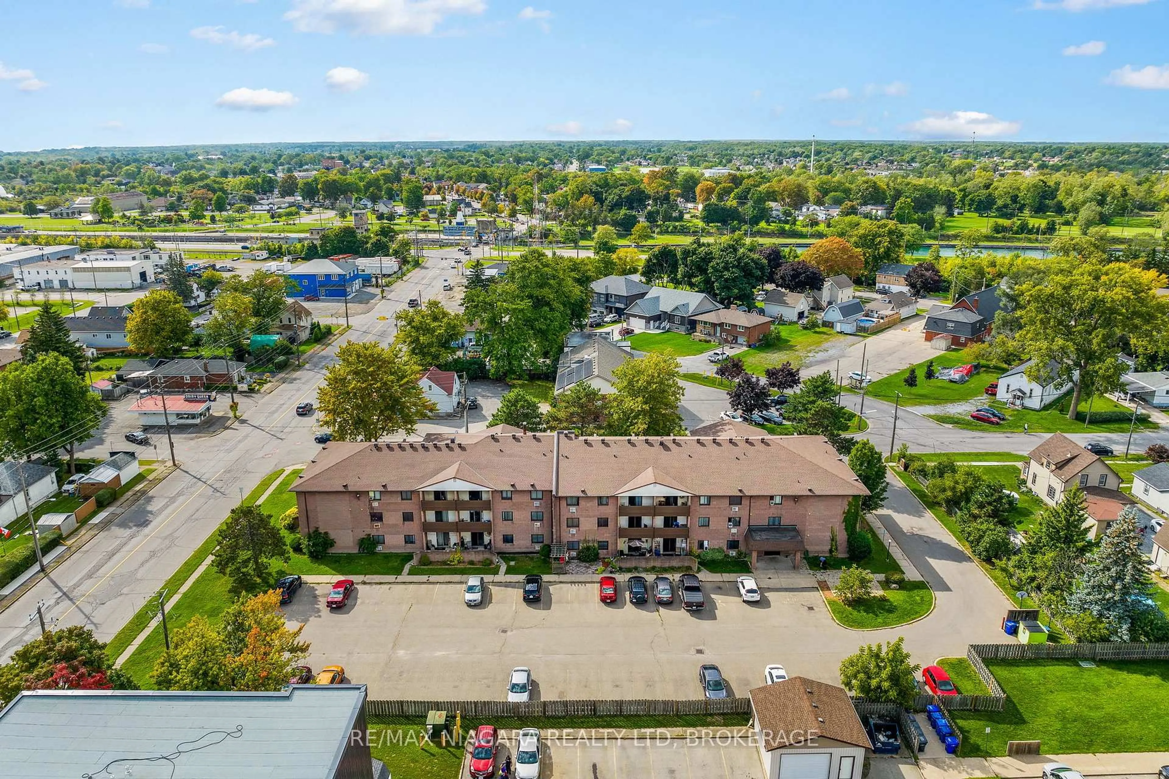 A pic from outside/outdoor area/front of a property/back of a property/a pic from drone, unknown for 72 Main St #323, Port Colborne Ontario L3K 5Z8