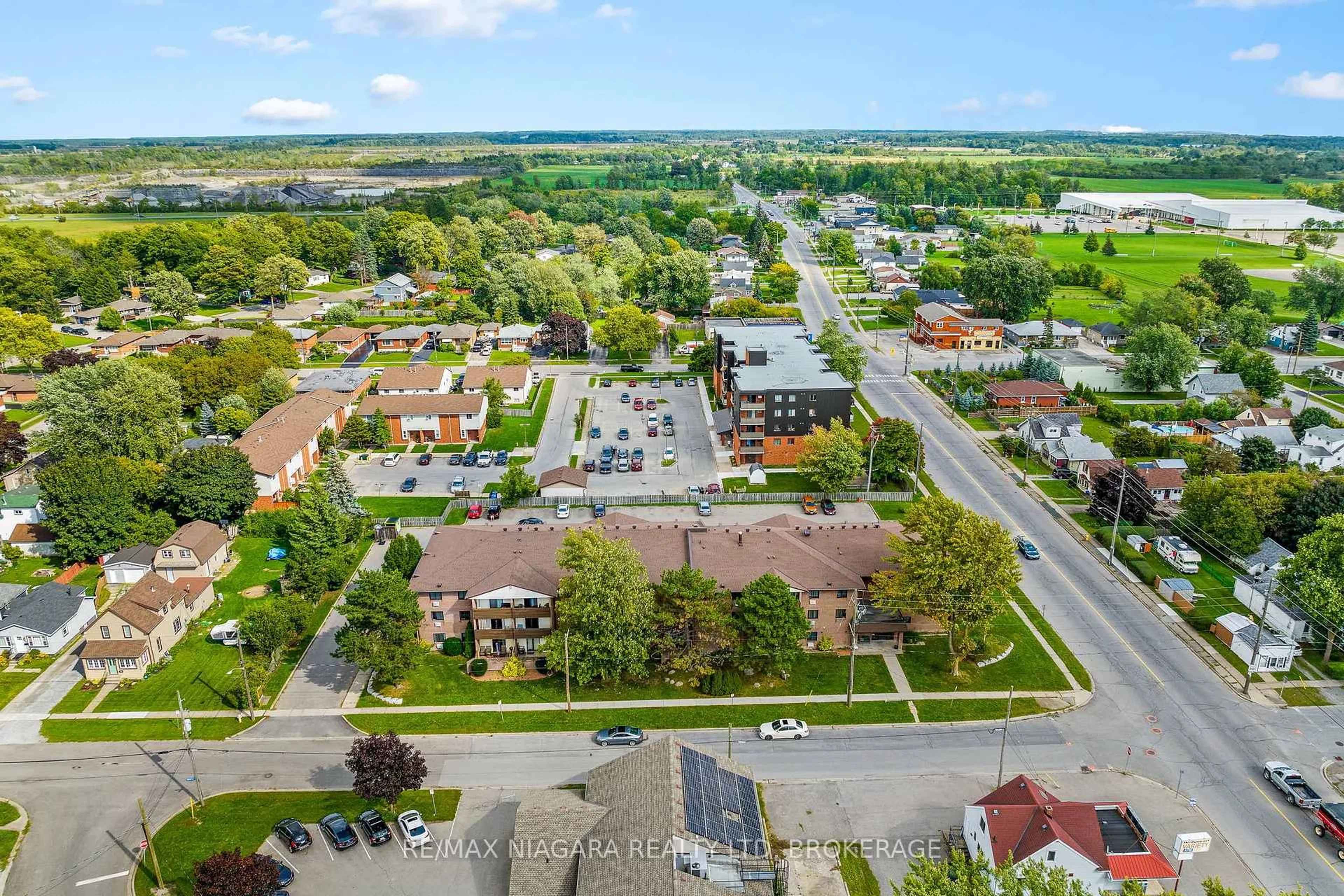 A pic from outside/outdoor area/front of a property/back of a property/a pic from drone, city buildings view from balcony for 72 Main St #323, Port Colborne Ontario L3K 5Z8