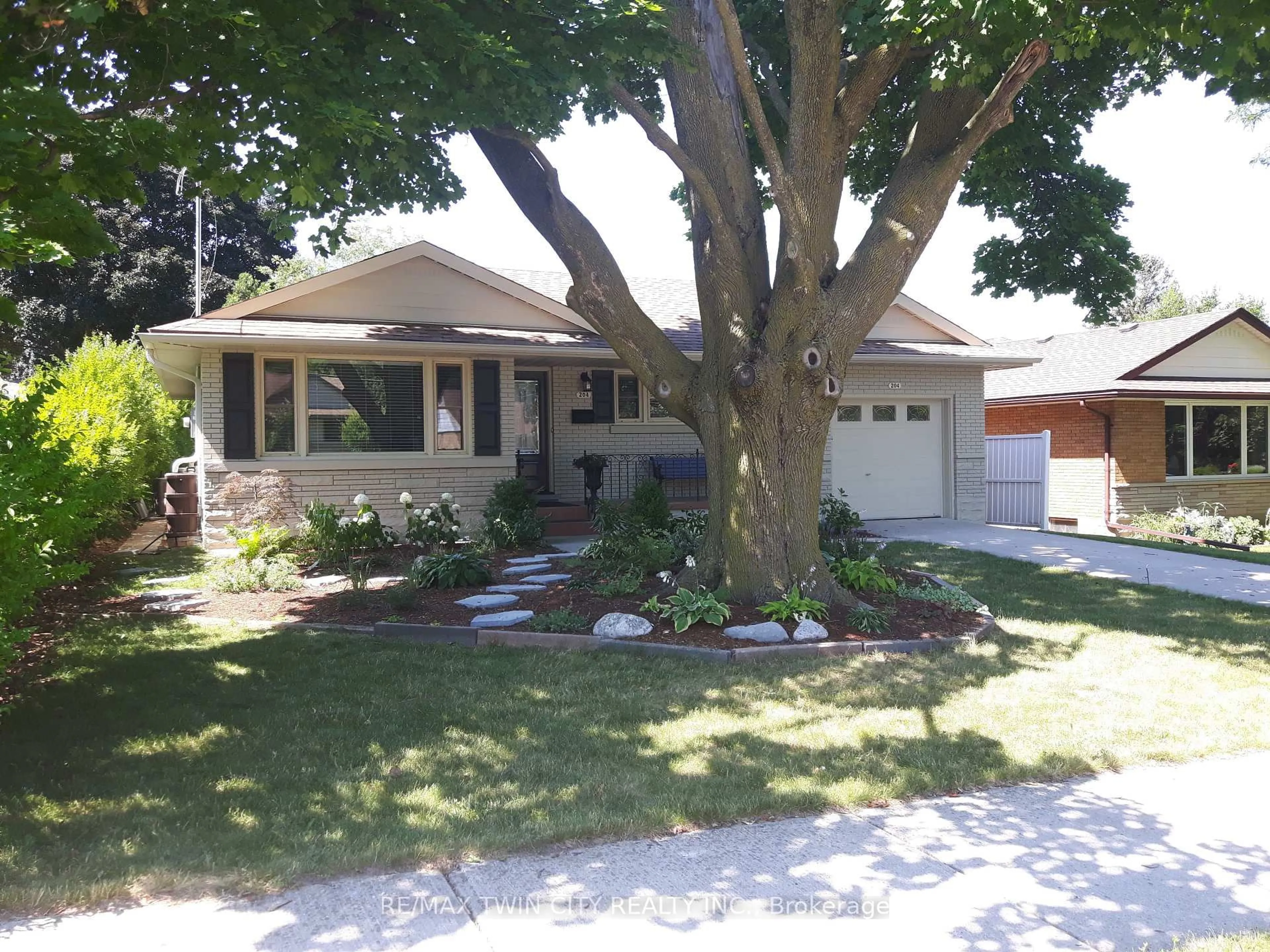 Home with vinyl exterior material, street for 204 Rodney St, Waterloo Ontario N2J 1G5