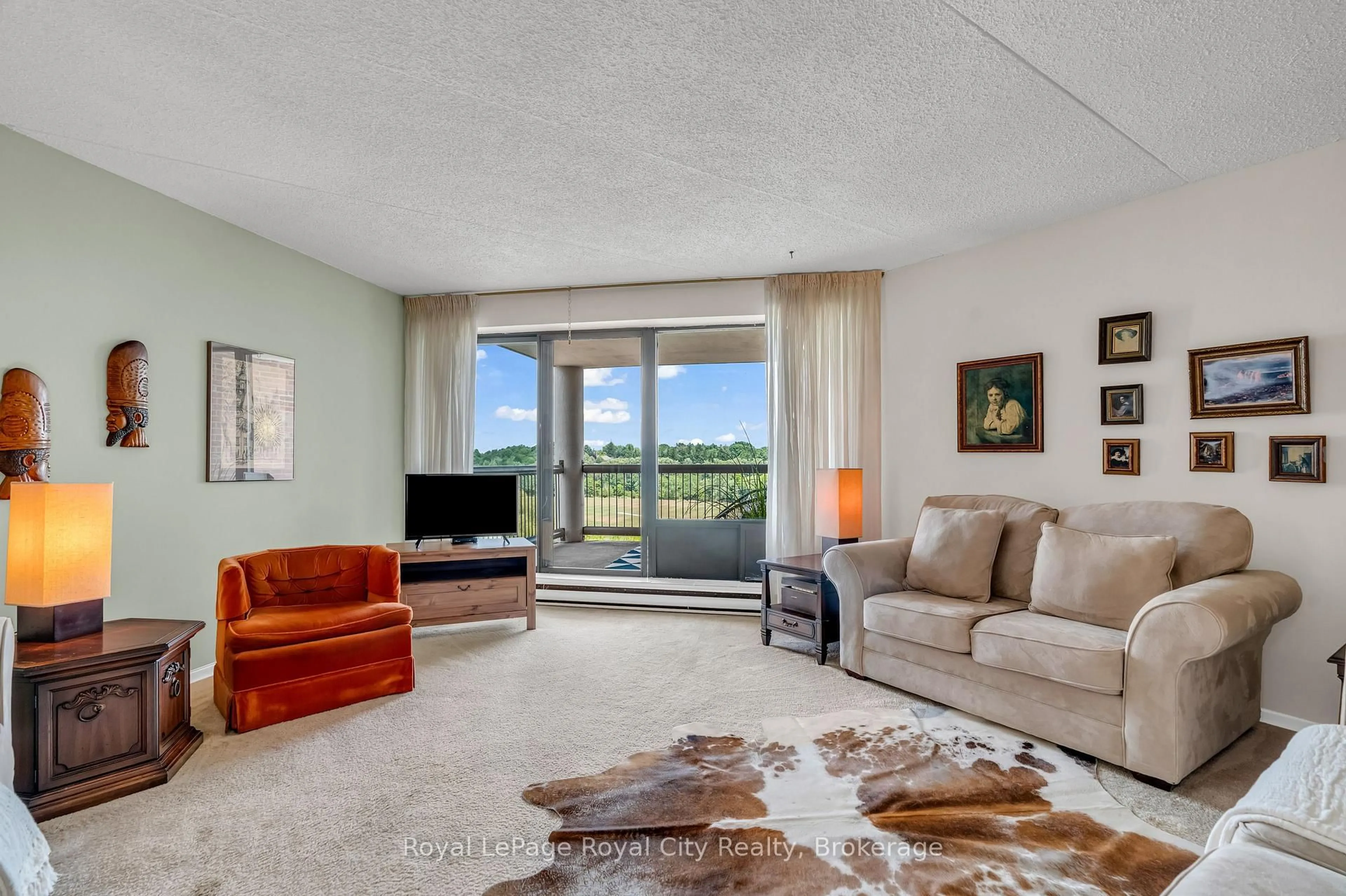 Living room with furniture, unknown for 22 Marilyn Dr #803, Guelph Ontario N1H 7T1