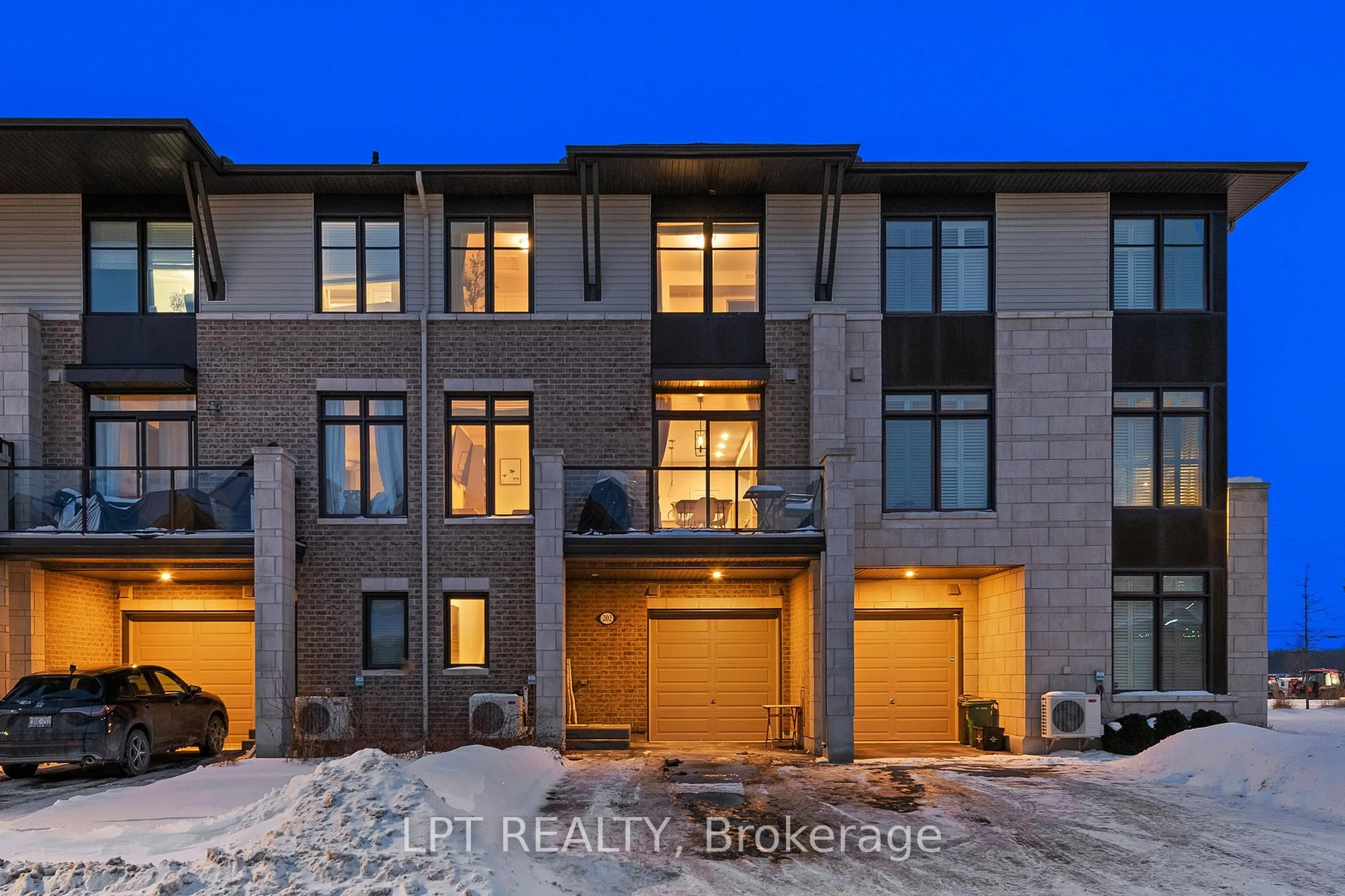 Home with brick exterior material, street for 202 Hawkmere Way, Ottawa Ontario K1T 0R5