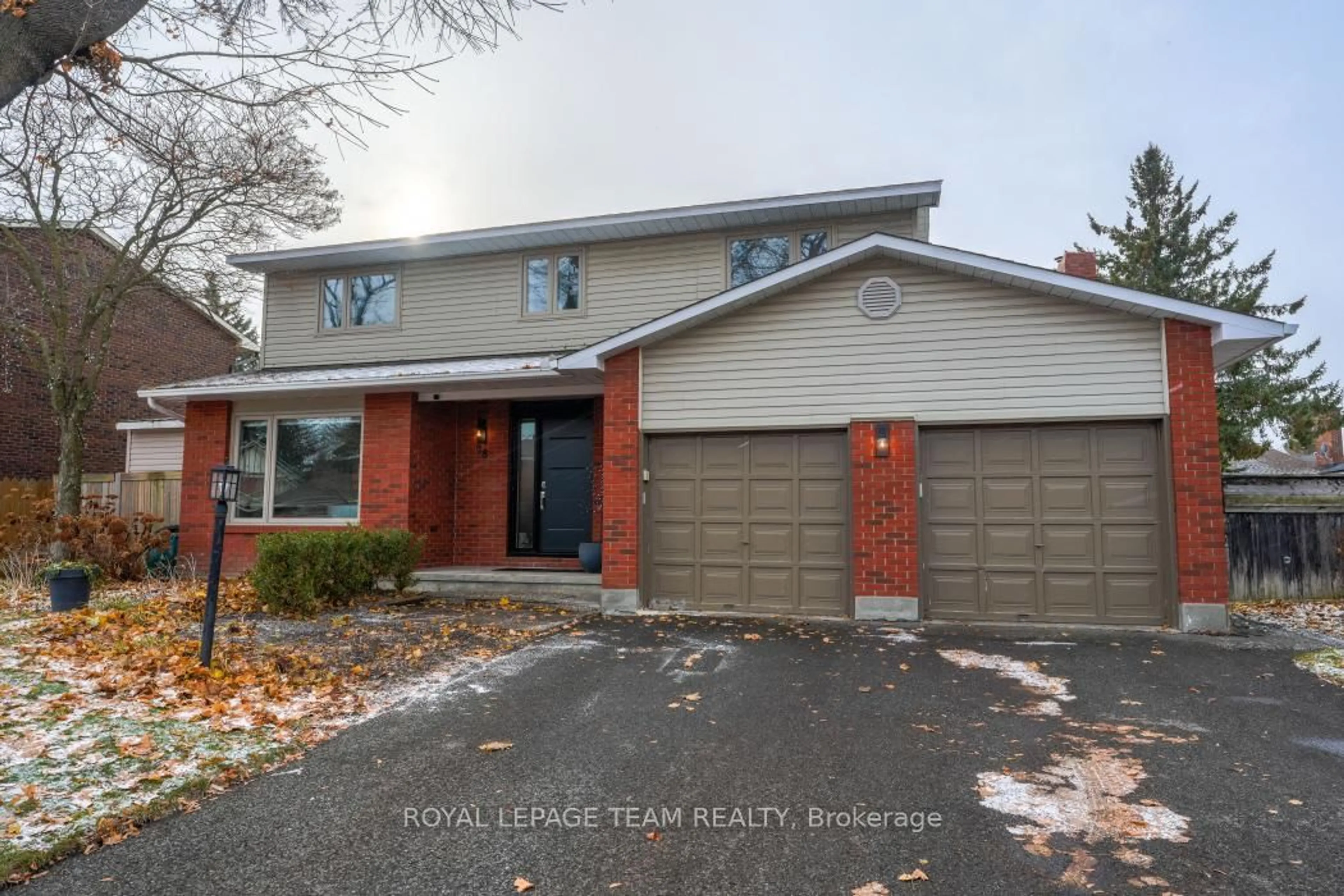Home with brick exterior material, street for 28 Holitman Dr, Barrhaven Ontario K2J 2A9