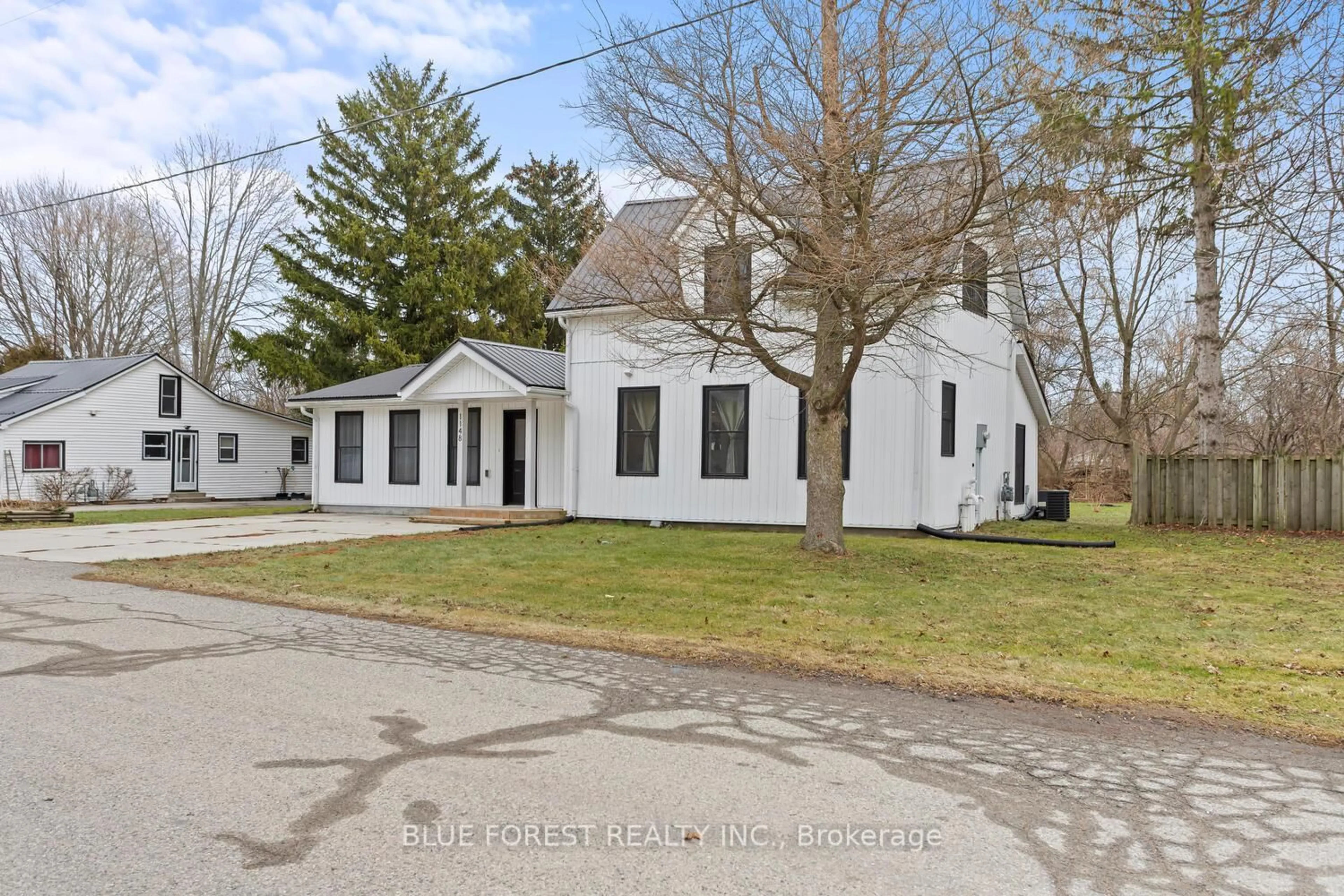 A pic from outside/outdoor area/front of a property/back of a property/a pic from drone, street for 1148 Jane St, West Elgin Ontario N0L 2P0