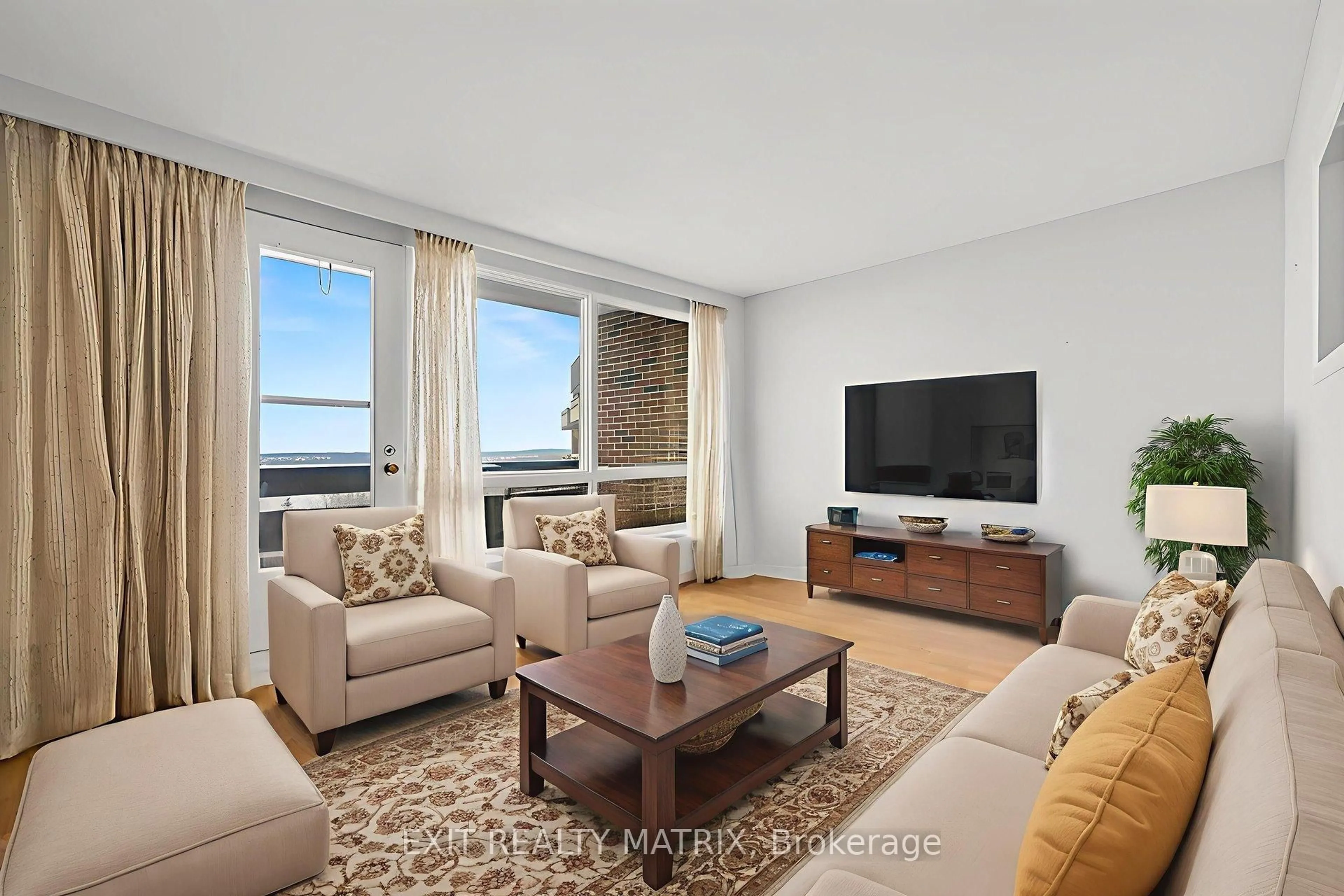 Living room with furniture, unknown for 3100 Carling Ave #1021, Ottawa Ontario K2B 6J6