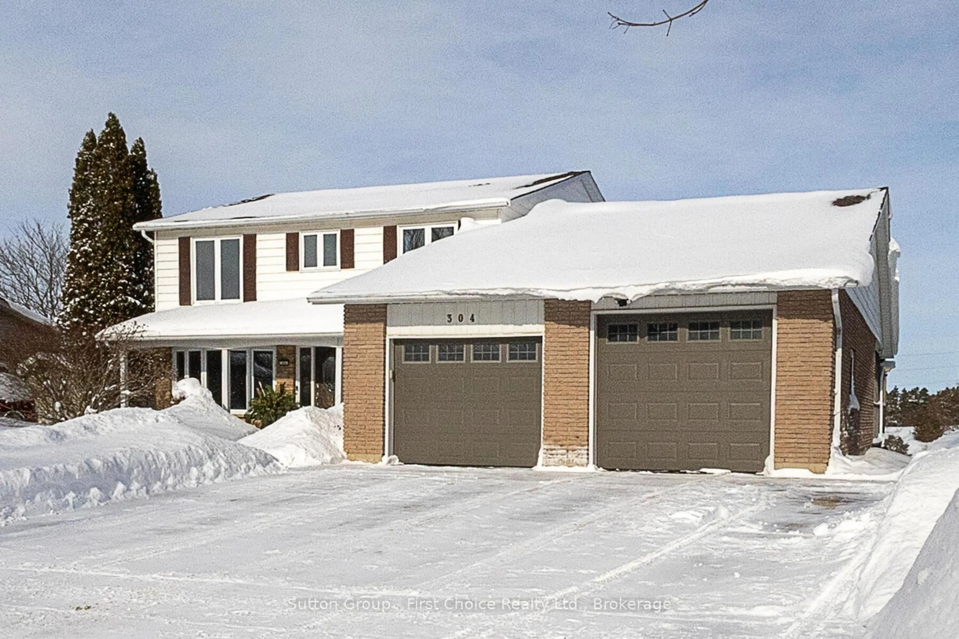 Home with vinyl exterior material, street for 304 Devon St, Stratford Ontario N5A 2Z9