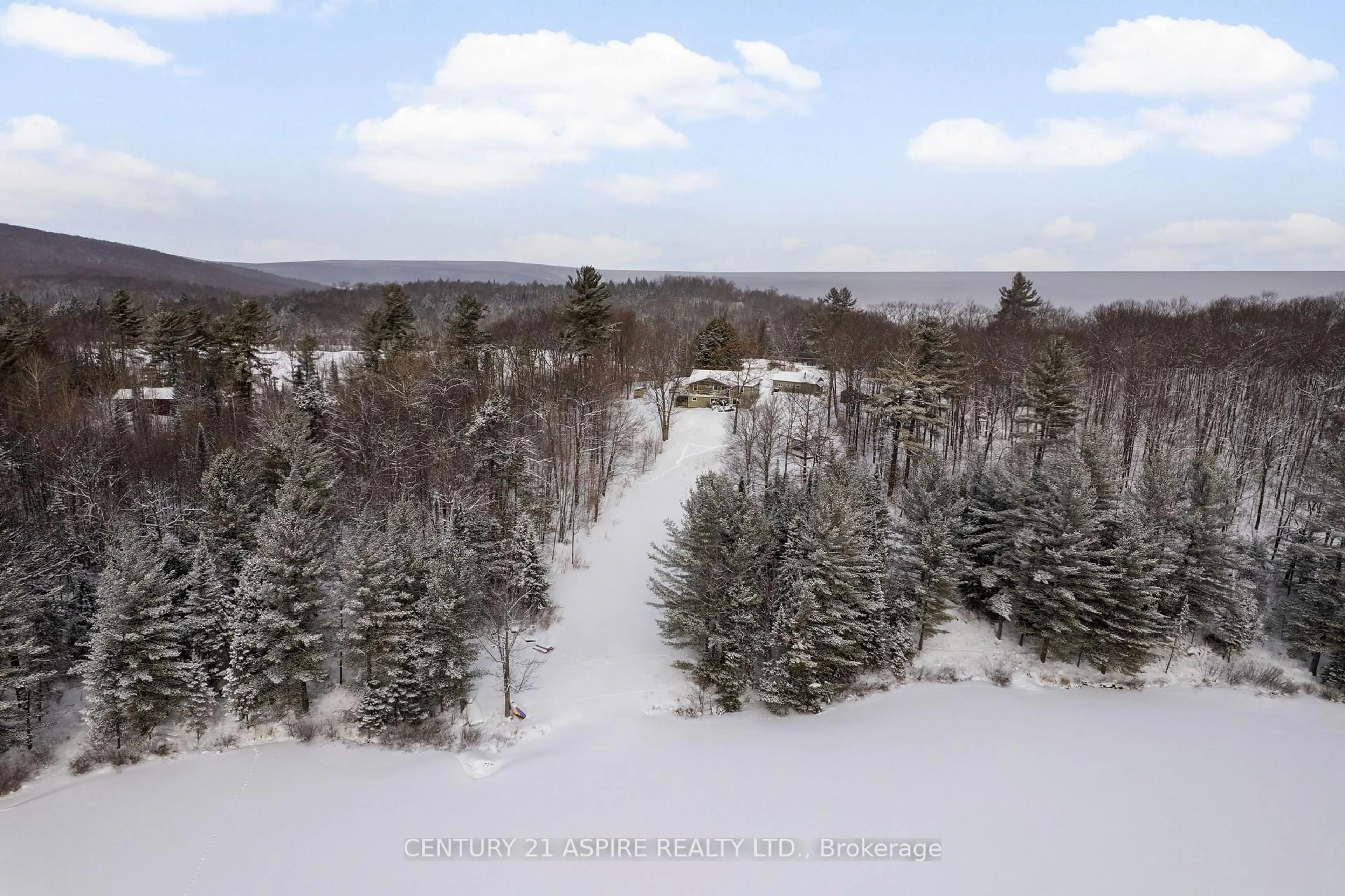 A pic from outside/outdoor area/front of a property/back of a property/a pic from drone, forest/trees view for 72 Maplewood Rd, Combermere Ontario K0J 1L0