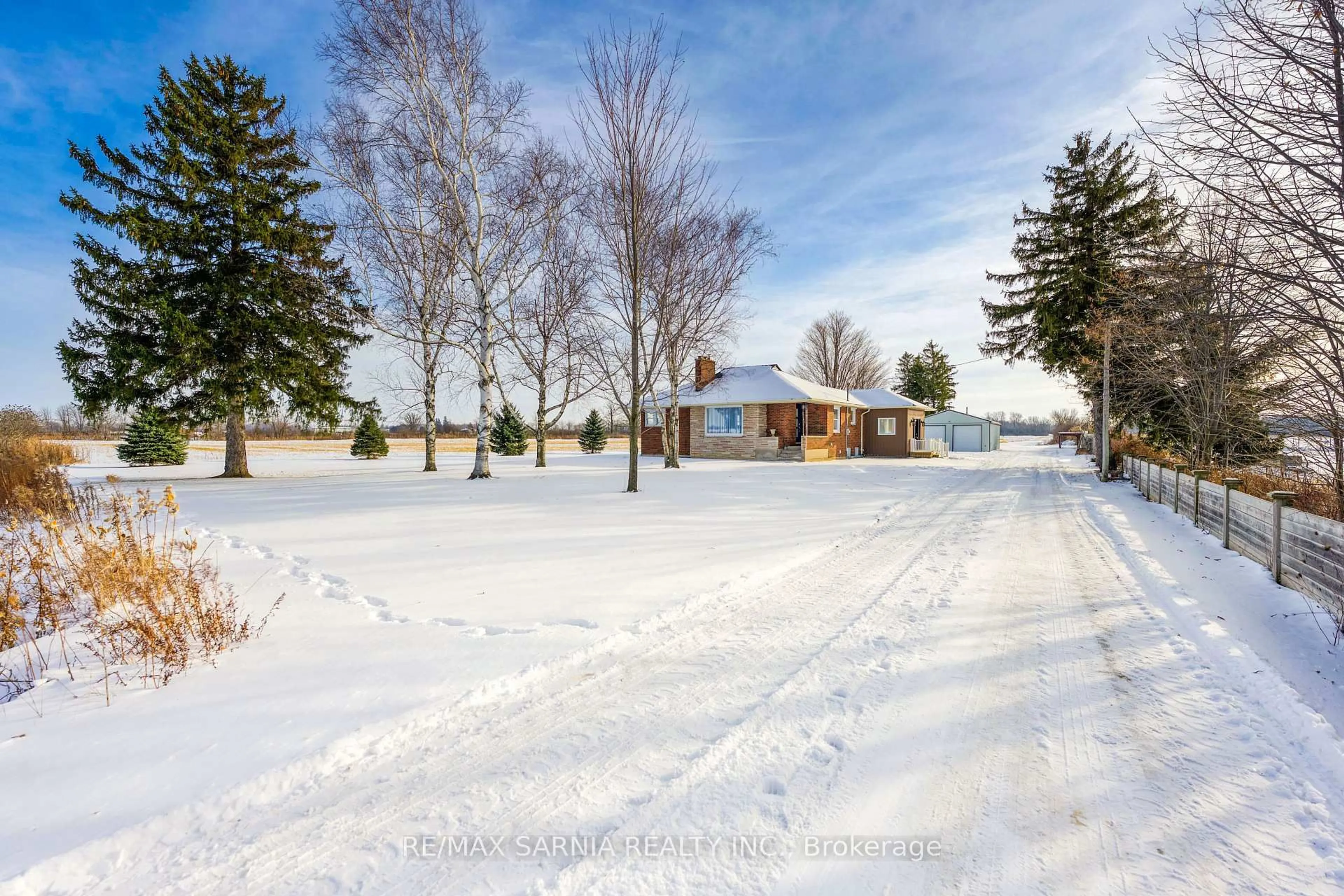 A pic from outside/outdoor area/front of a property/back of a property/a pic from drone, street for 4083 LONDON Line, Plympton-Wyoming Ontario N0N 1T0