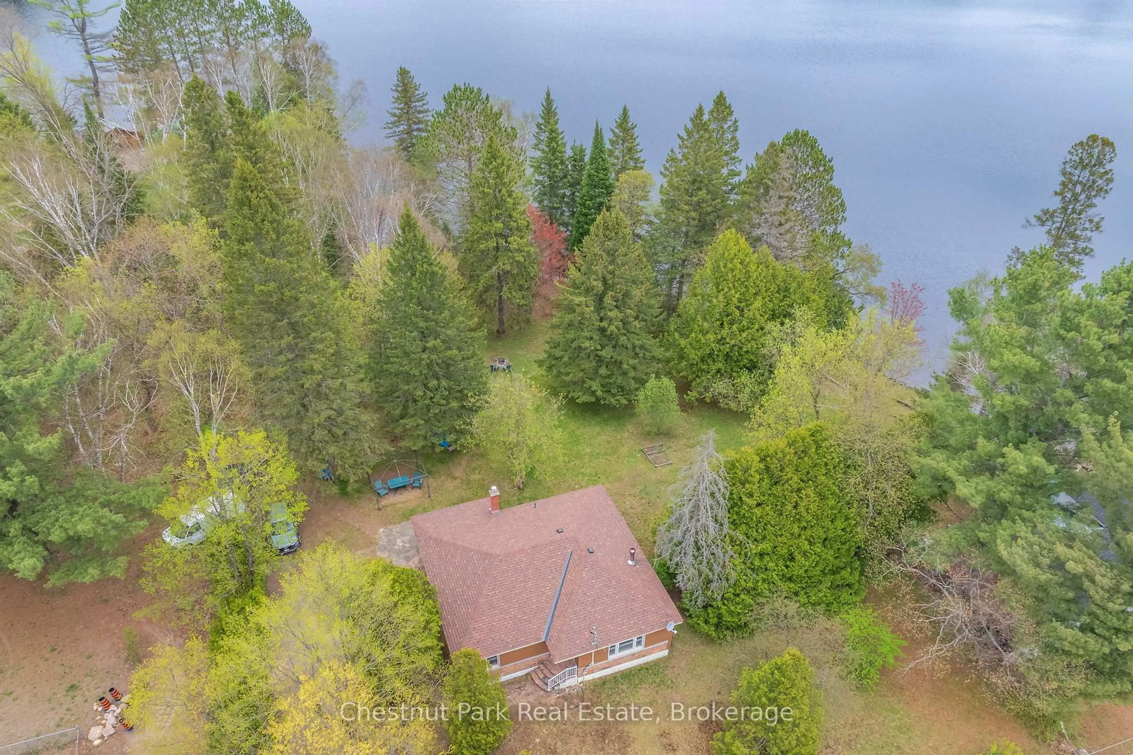 A pic from outside/outdoor area/front of a property/back of a property/a pic from drone, water/lake/river/ocean view for 24 Main St, Kearney Ontario P0A 1M0