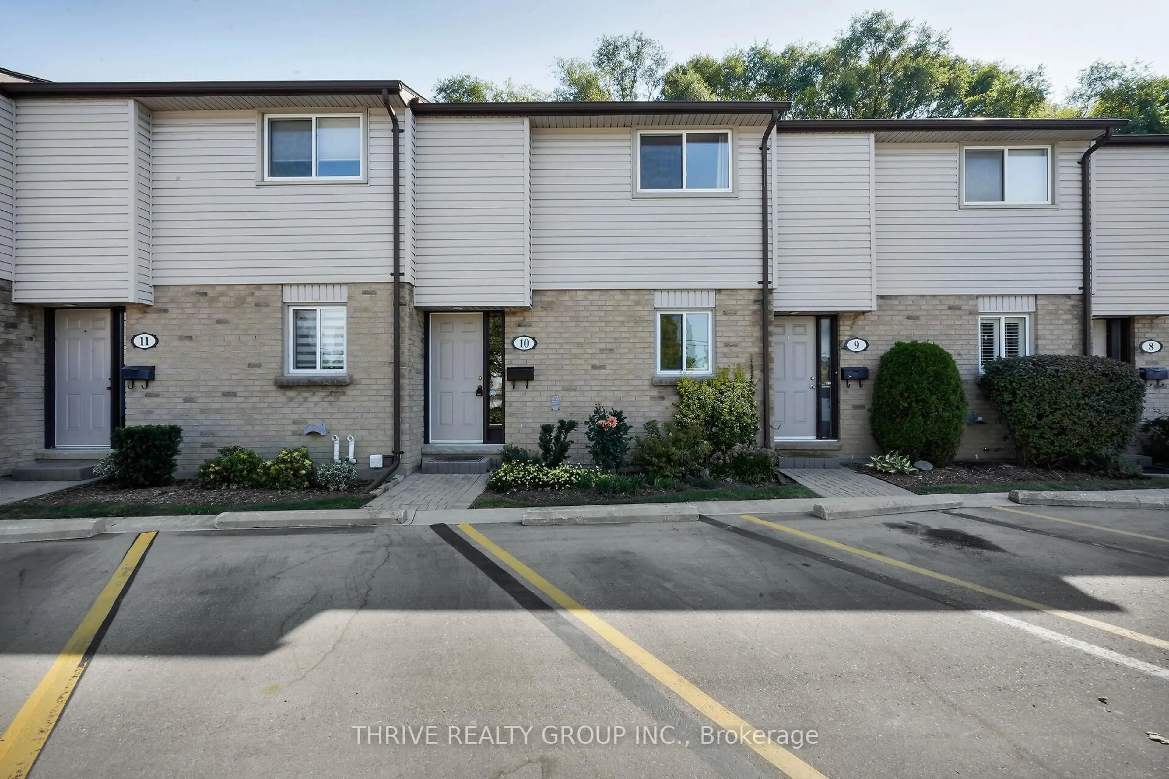 A pic from outside/outdoor area/front of a property/back of a property/a pic from drone, street for 215 Commissioners Rd #10, London South Ontario N6J 1X9
