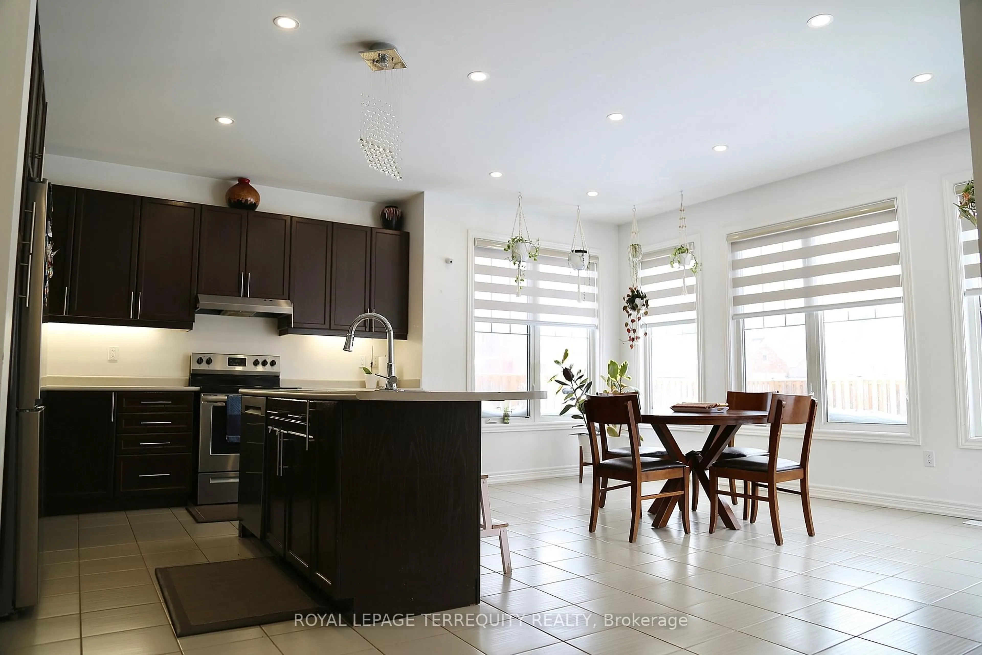 Open concept kitchen, ceramic/tile floor for 6244 St Michael Ave, Niagara Falls Ontario L2H 0C8