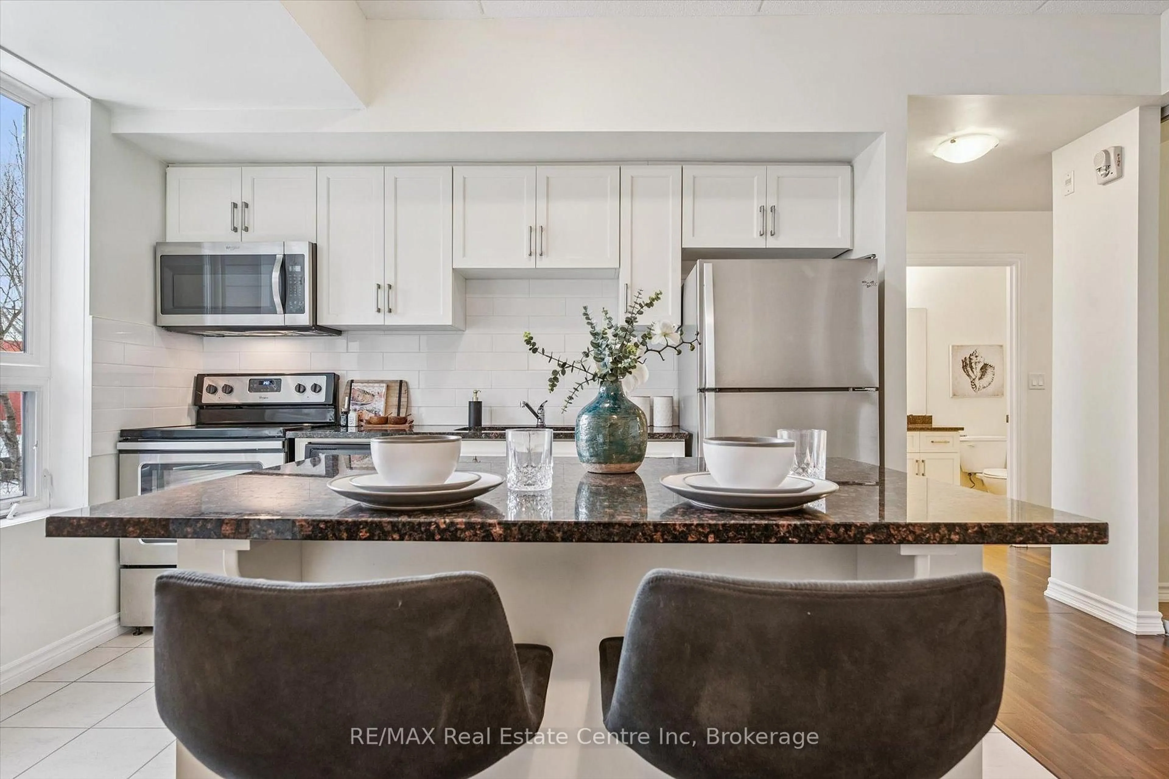 Open concept kitchen, ceramic/tile floor for 1280 Gordon St #210, Guelph Ontario N1L 0N6