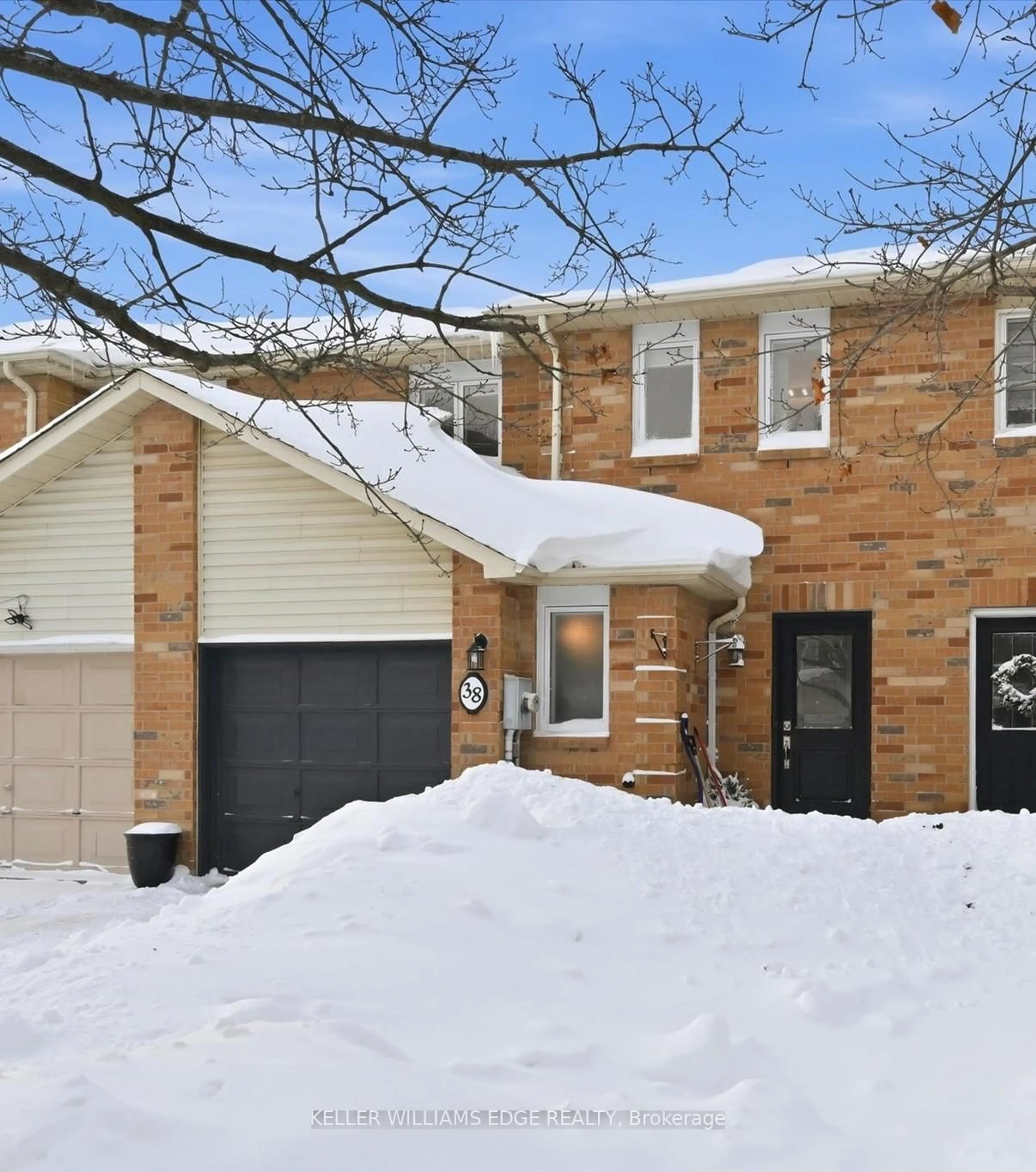 Home with brick exterior material, street for 38 Grindstone Way, Hamilton Ontario L9H 7B7