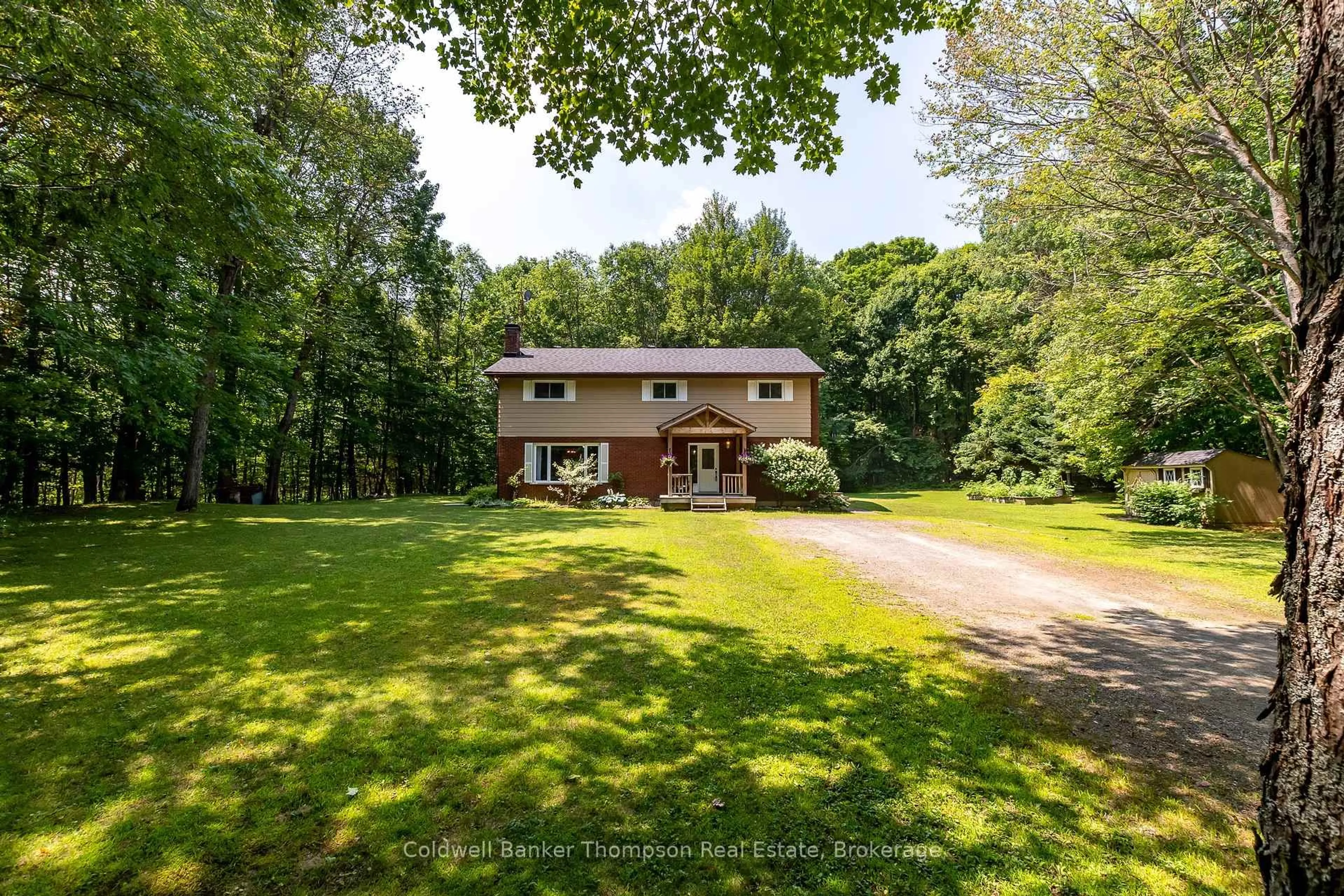 A pic from outside/outdoor area/front of a property/back of a property/a pic from drone, unknown for 40 White Birch Lane, Huntsville Ontario P1H 0G7