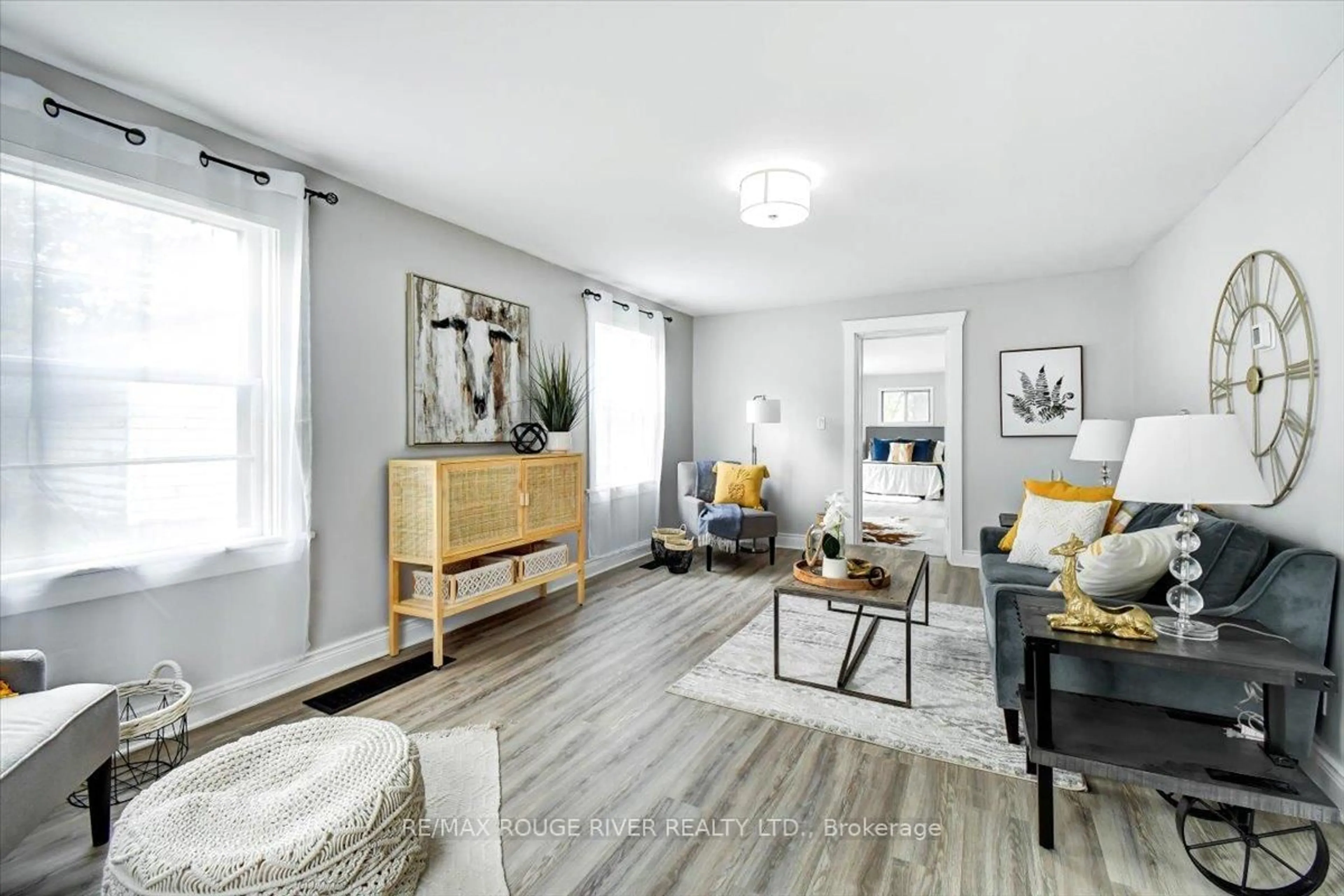 Living room with furniture, wood/laminate floor for 232 Lyle St, Alnwick/Haldimand Ontario K0K 2G0