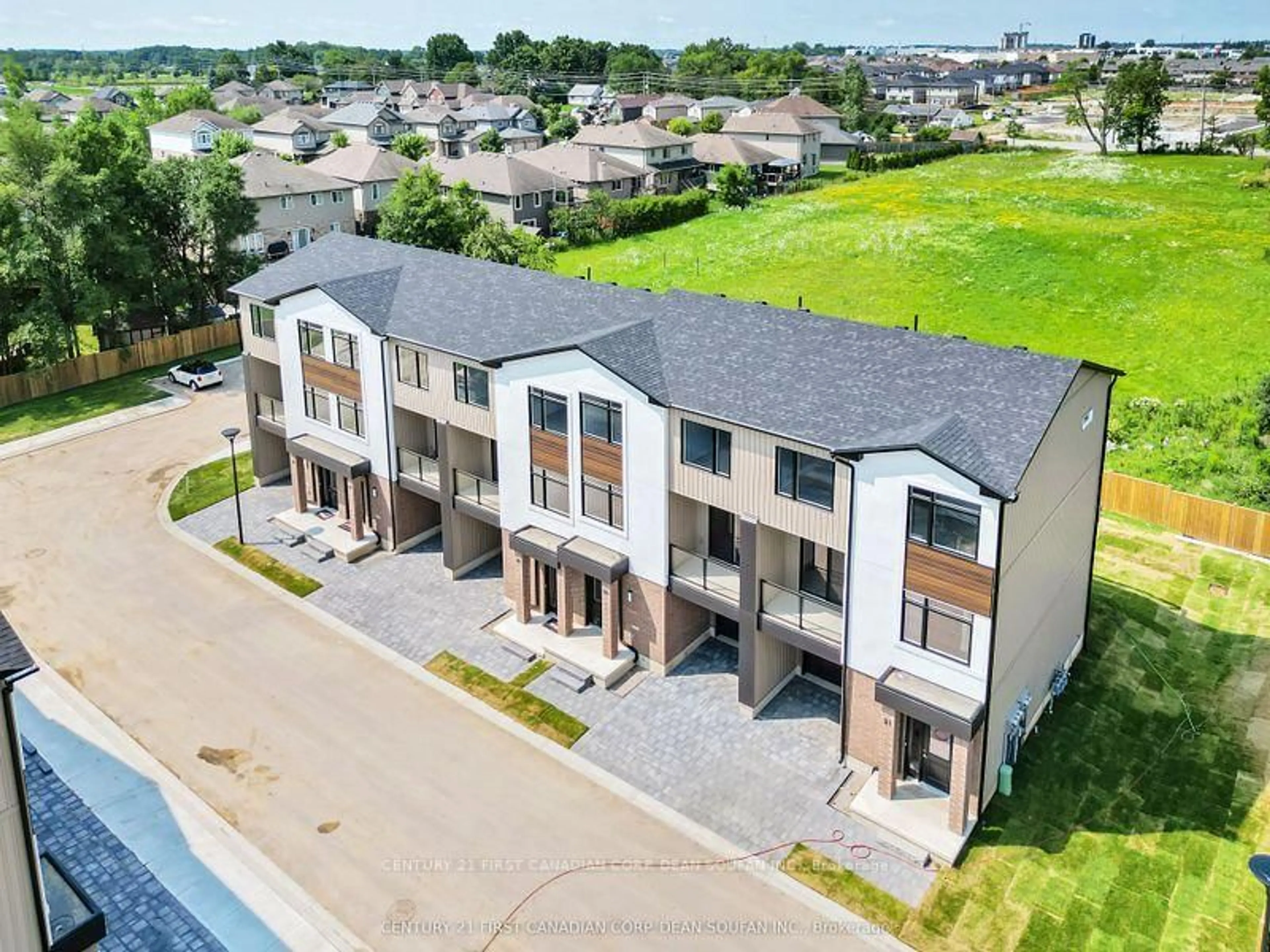 A pic from outside/outdoor area/front of a property/back of a property/a pic from drone, street for 349 Southdale Rd #18, London South Ontario N6E 1A2