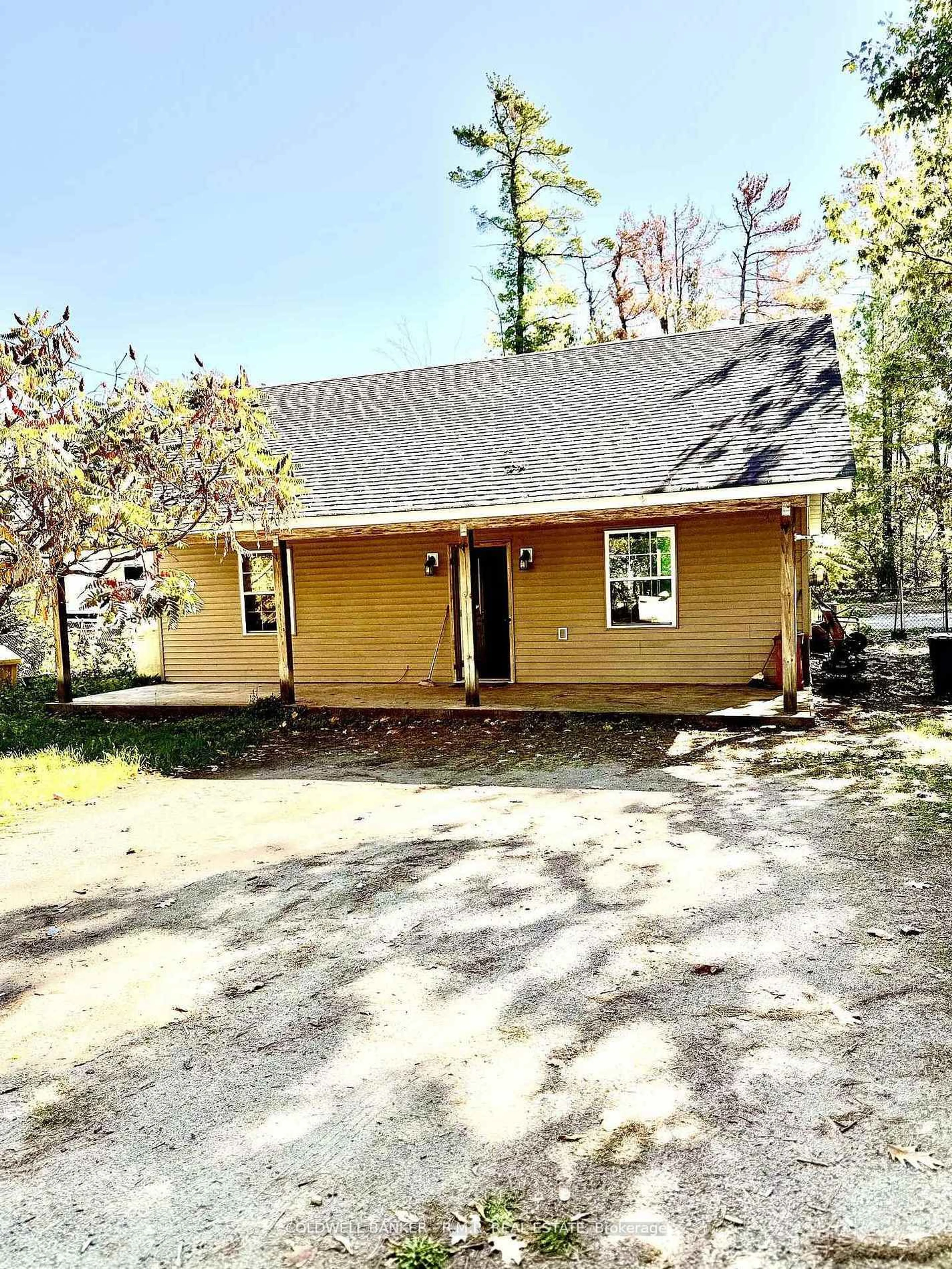 Home with vinyl exterior material, street for 2 Oakwood Dr, Kawartha Lakes Ontario K0M 1N0