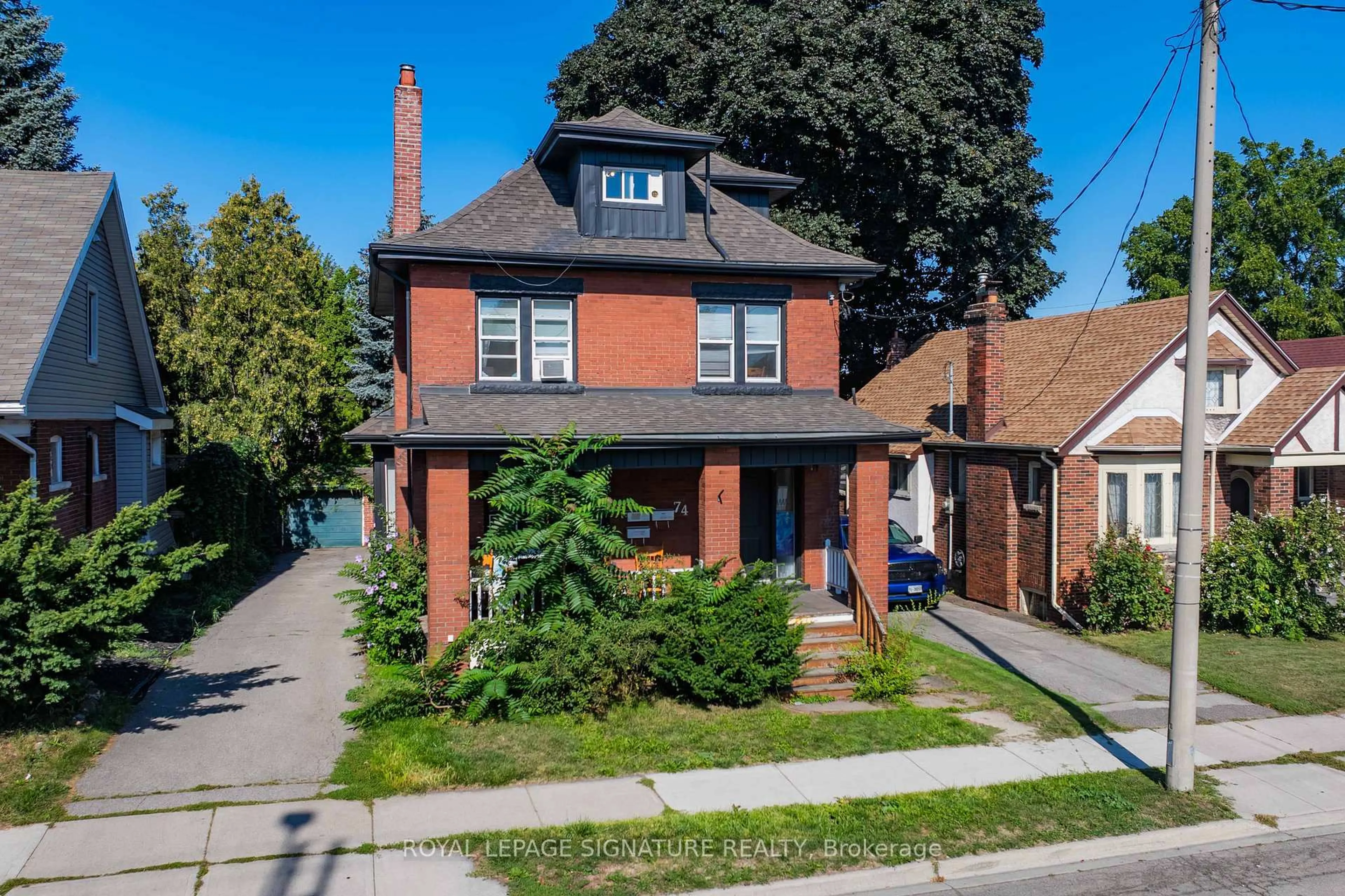 Home with brick exterior material, street for 74 Kenilworth Ave, Hamilton Ontario L8K 2S9