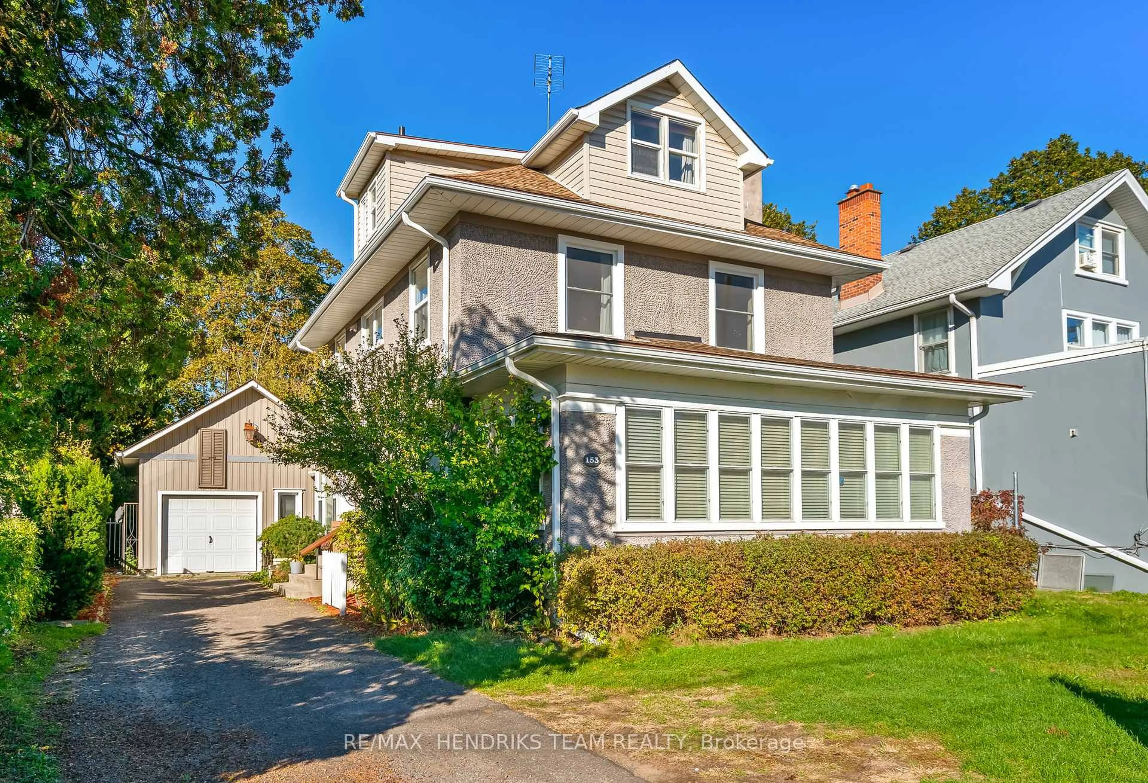 Home with vinyl exterior material, street for 153 Geneva St, St. Catharines Ontario L2R 4N7