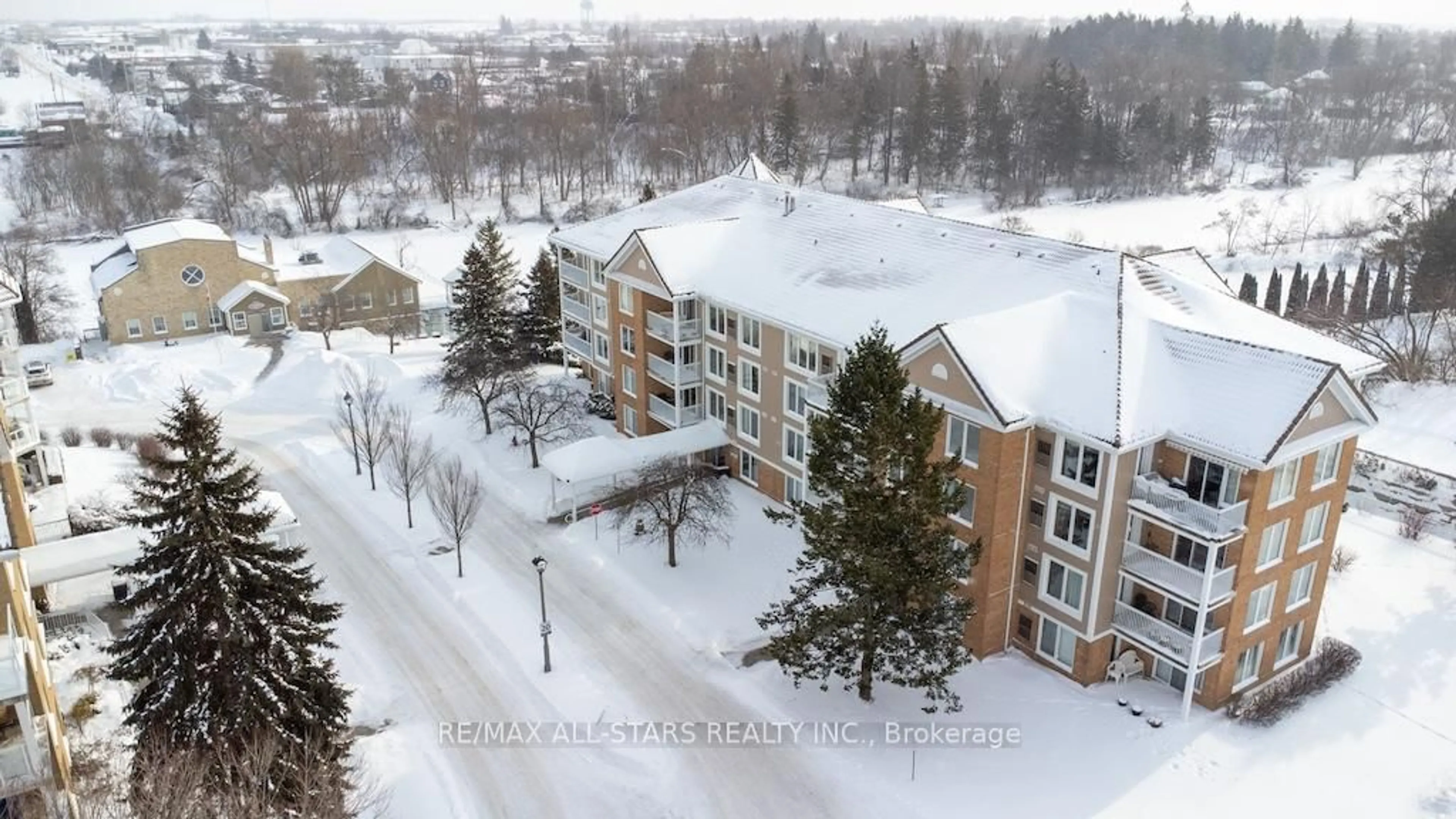 A pic from outside/outdoor area/front of a property/back of a property/a pic from drone, unknown for 50 Rivermill Blvd #408, Kawartha Lakes Ontario K9V 6C1