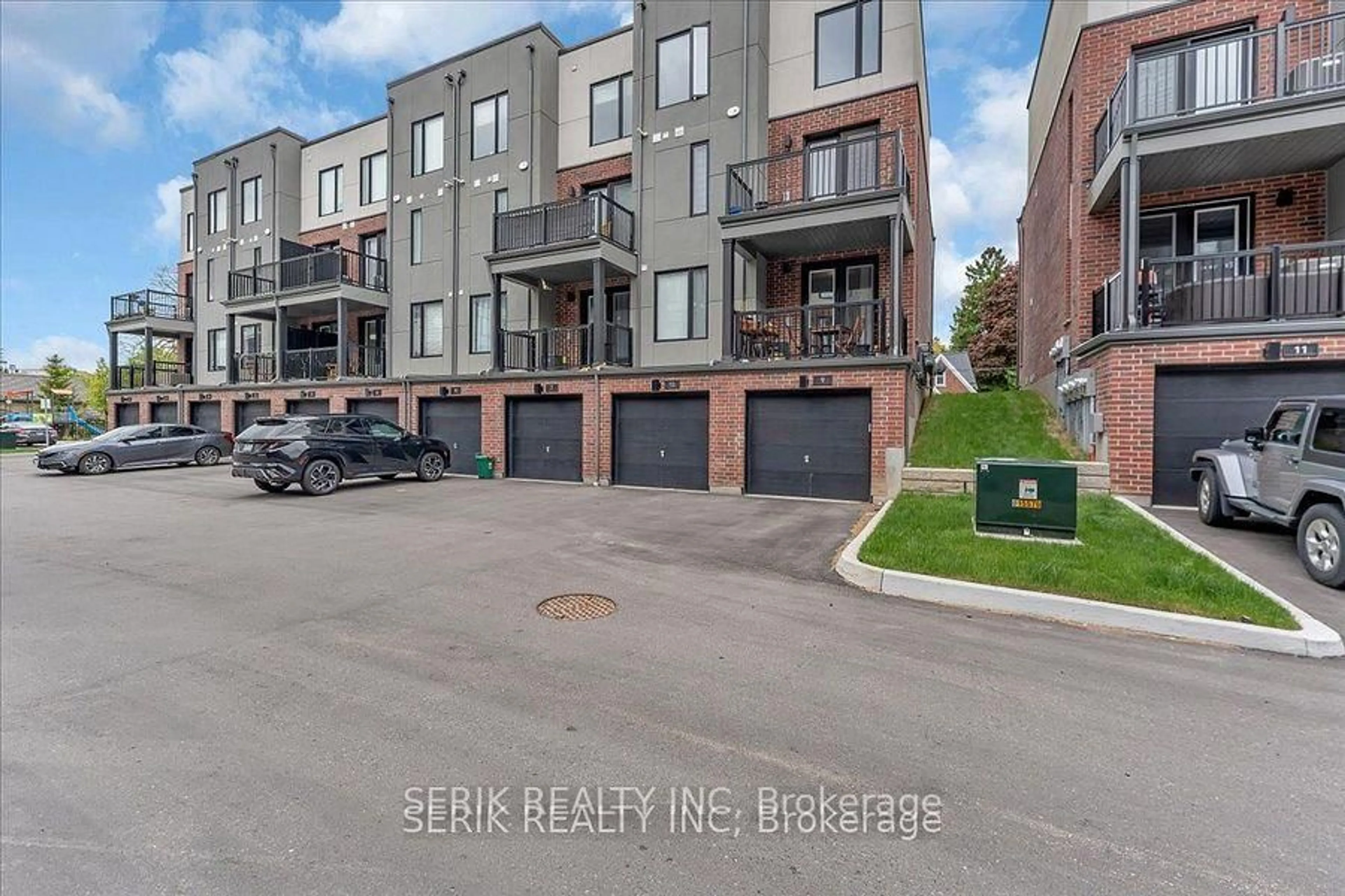 A pic from outside/outdoor area/front of a property/back of a property/a pic from drone, street for 99 Roger St #10, Waterloo Ontario N2J 1A4