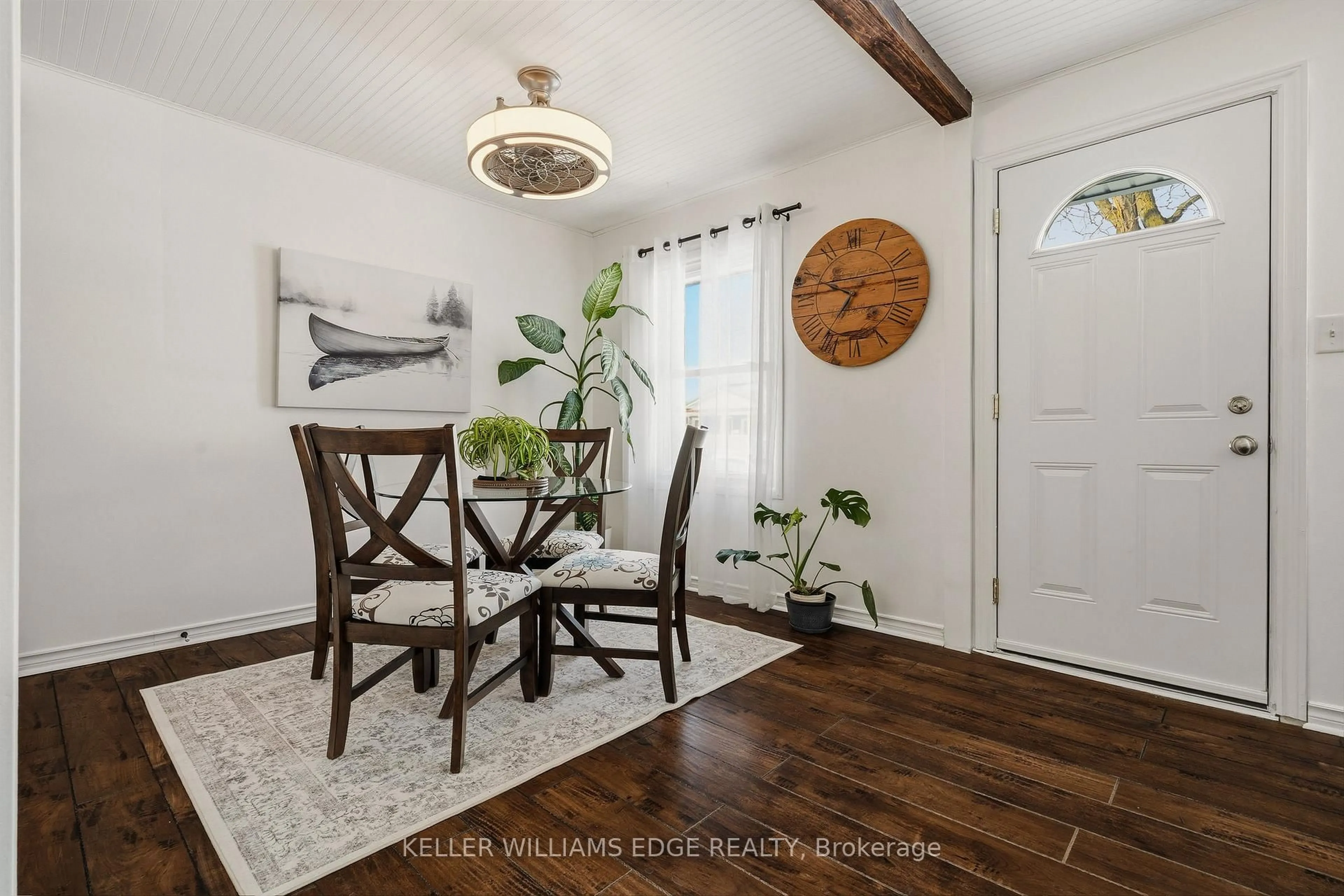 Dining room, wood/laminate floor for 56 Tolton Ave, Hamilton Ontario L8H 5N6