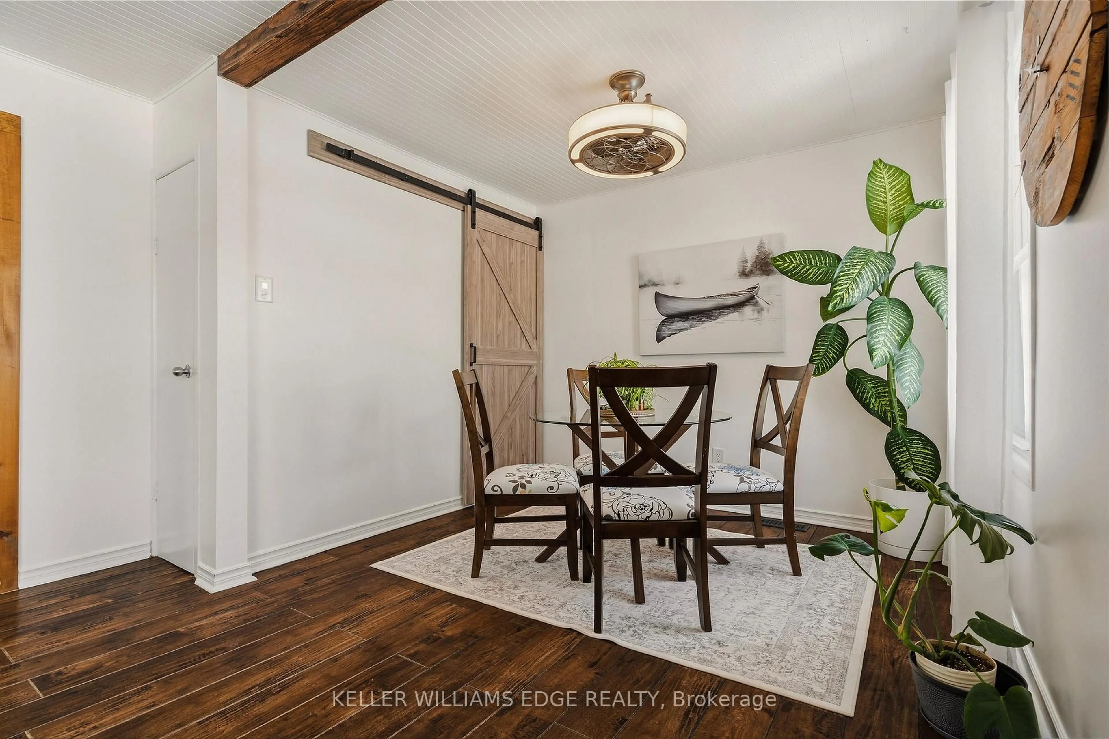 Dining room, wood/laminate floor for 56 Tolton Ave, Hamilton Ontario L8H 5N6