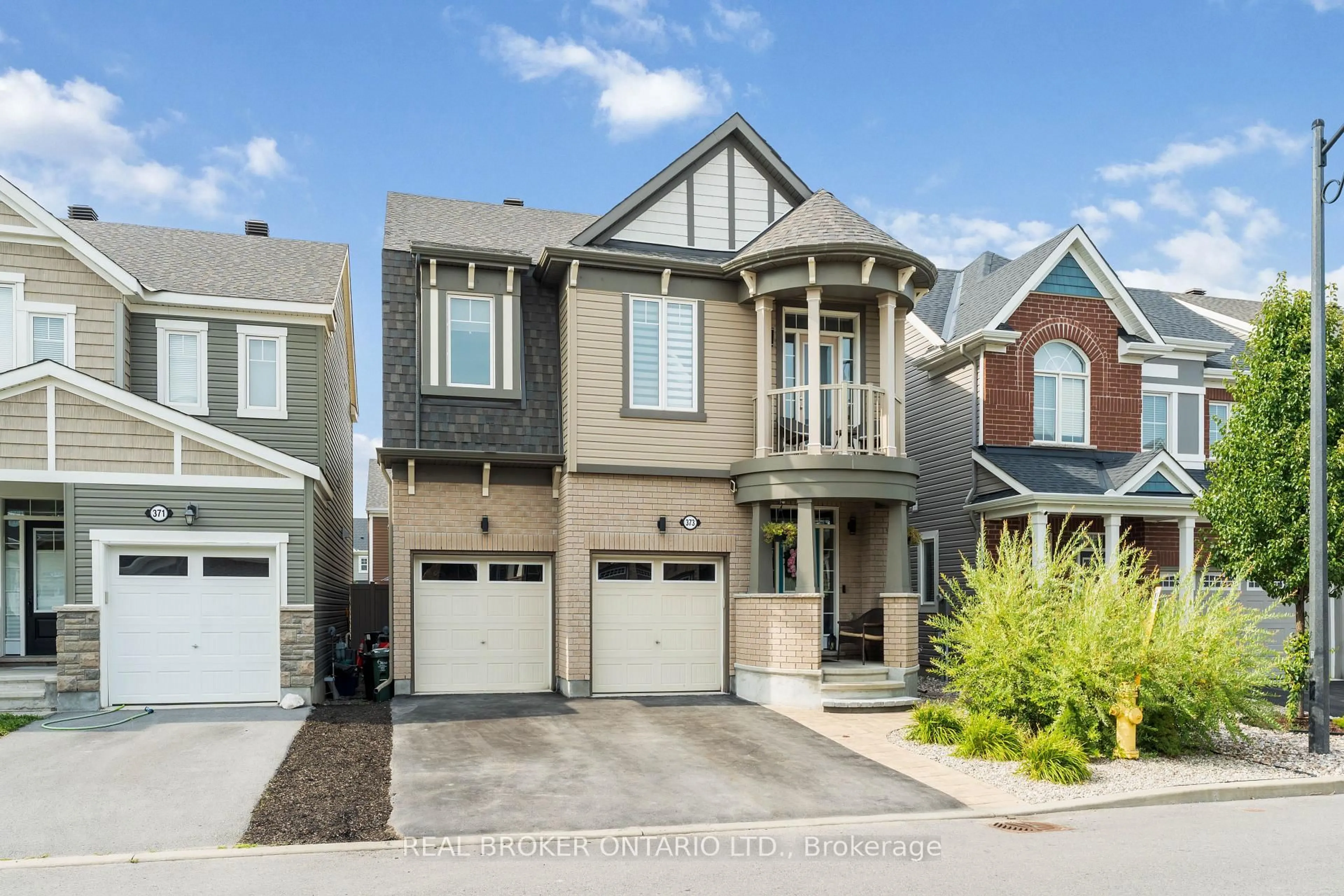 Home with brick exterior material, street for 373 River Landing Ave, Ottawa Ontario K2J 6K6