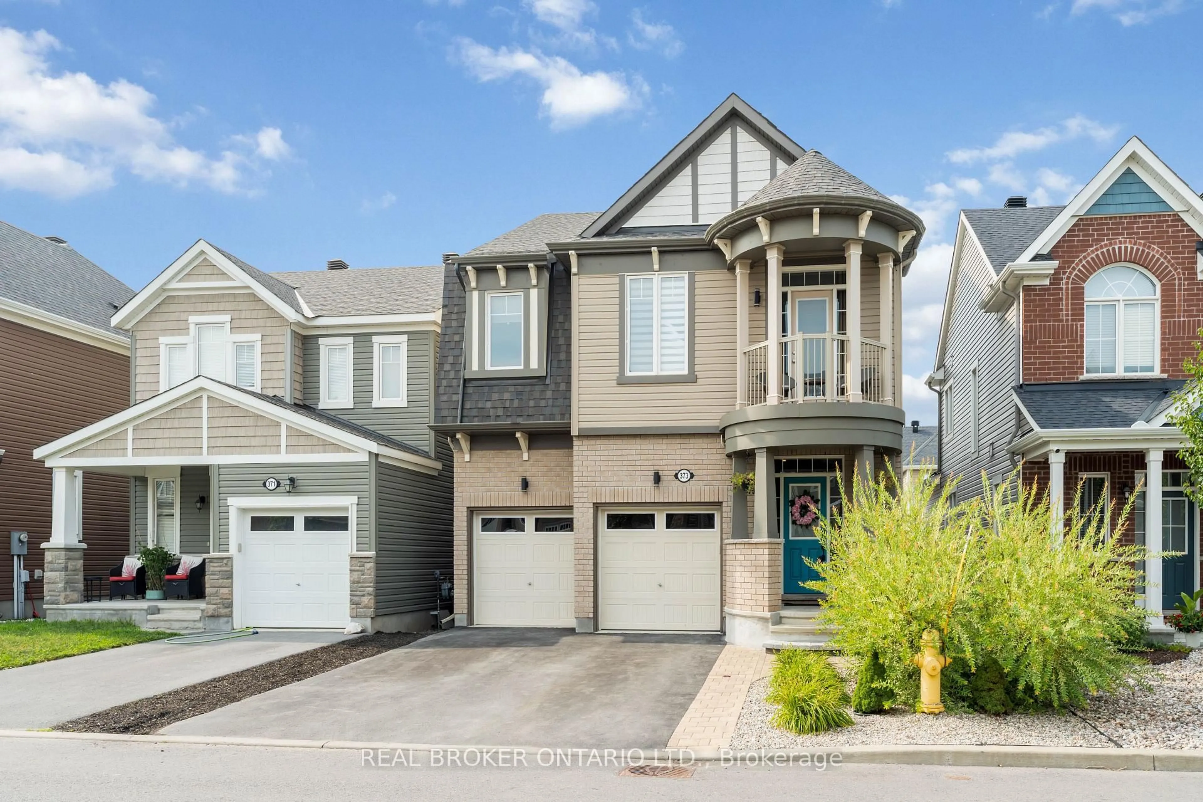 Home with vinyl exterior material, street for 373 River Landing Ave, Ottawa Ontario K2J 6K6