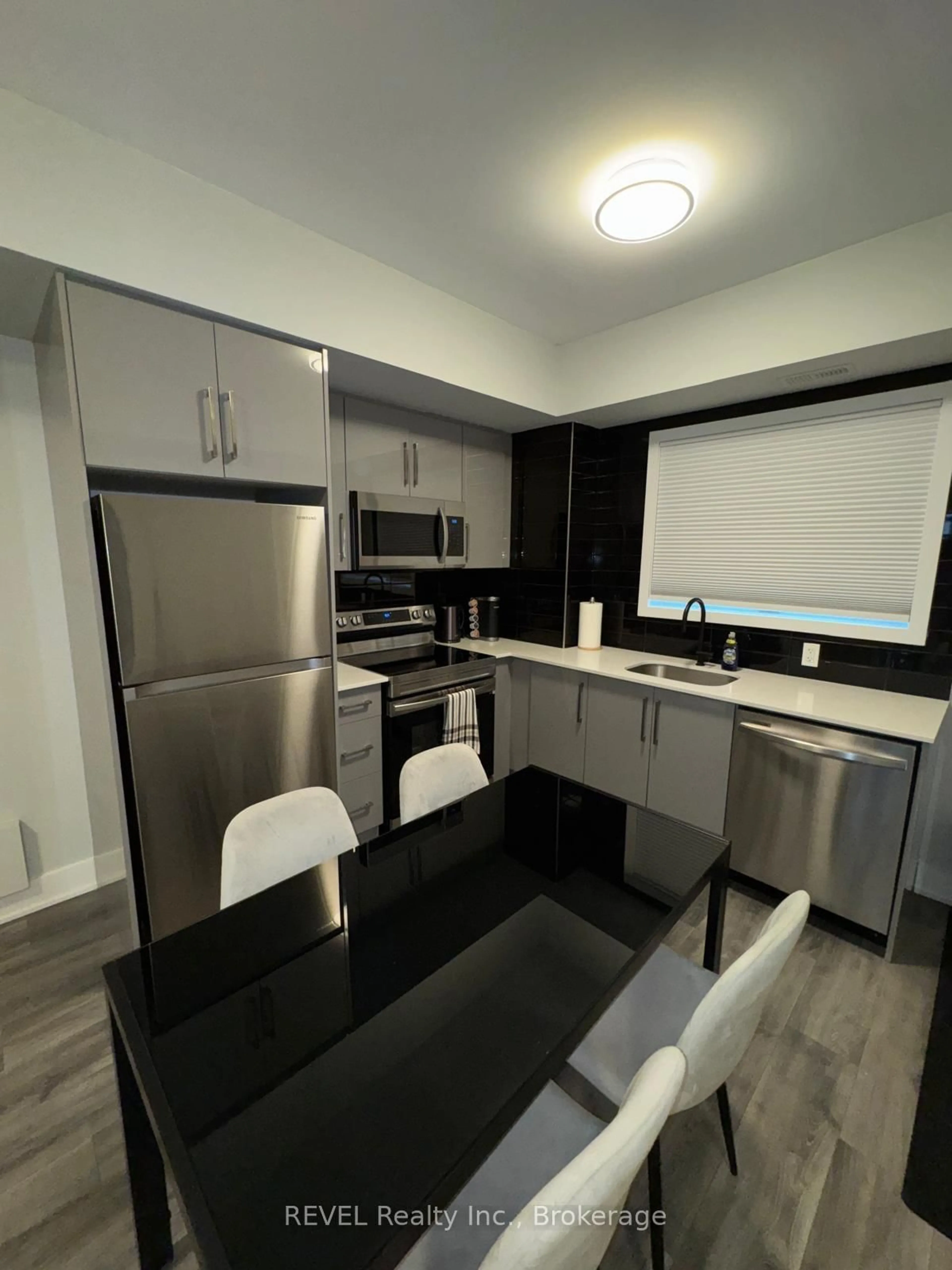 Open concept kitchen, unknown for 6065 Mcleod Rd #111, Niagara Falls Ontario L2G 0Z7
