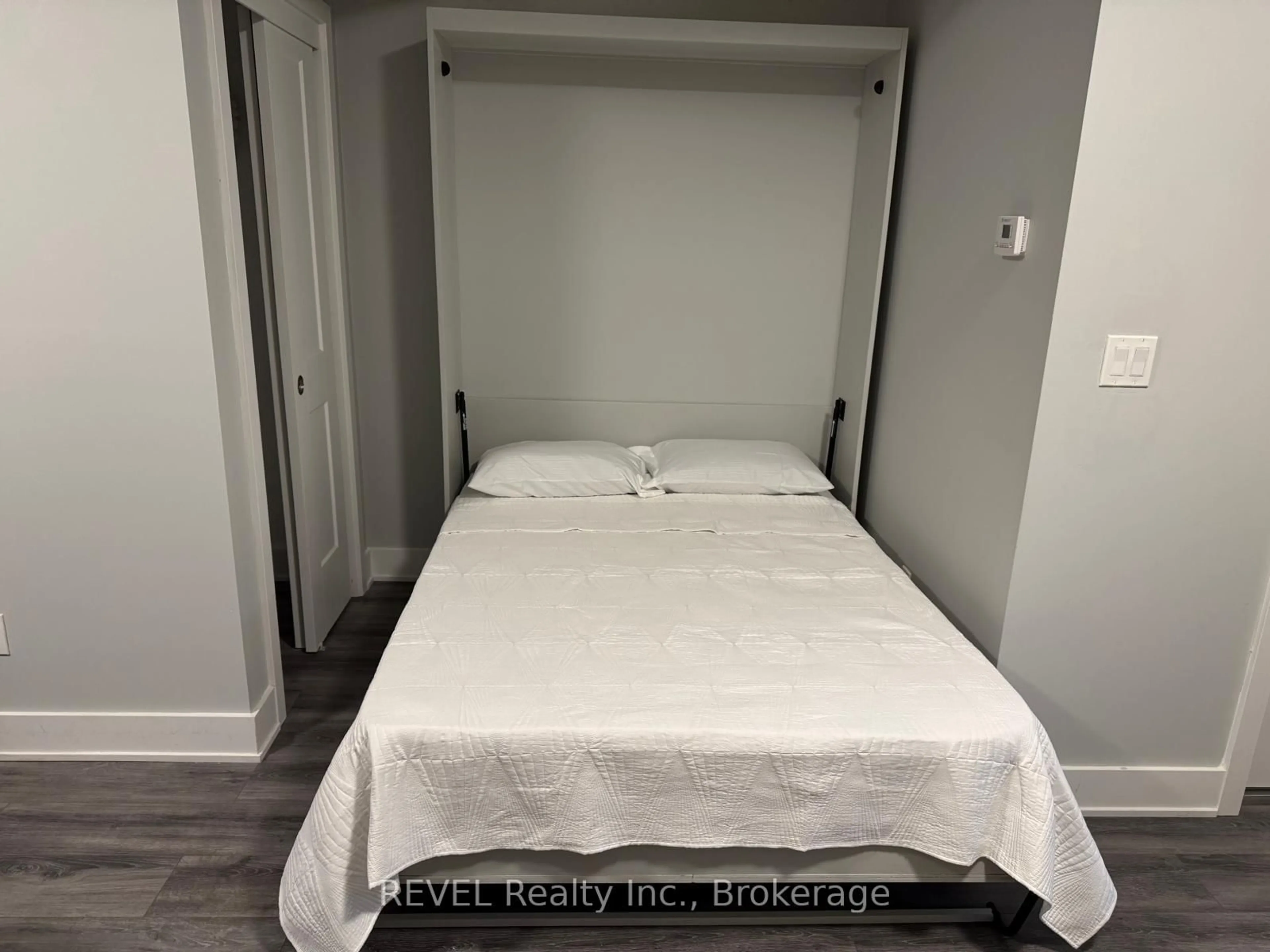 Bedroom with bed, unknown for 6065 Mcleod Rd #111, Niagara Falls Ontario L2G 0Z7