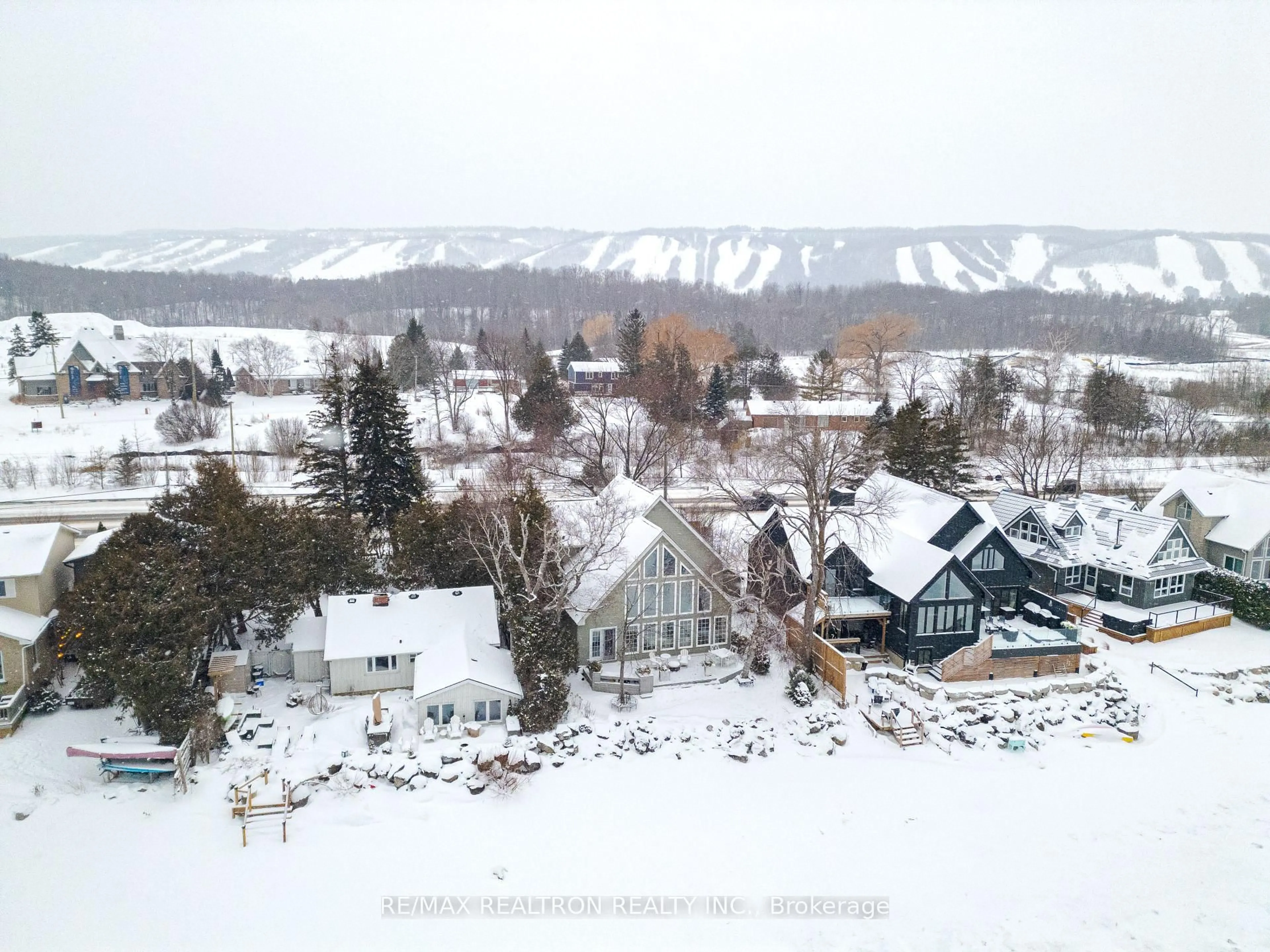 A pic from outside/outdoor area/front of a property/back of a property/a pic from drone, mountain view for 209733 Highway 26, Blue Mountains Ontario L9Y 0M8