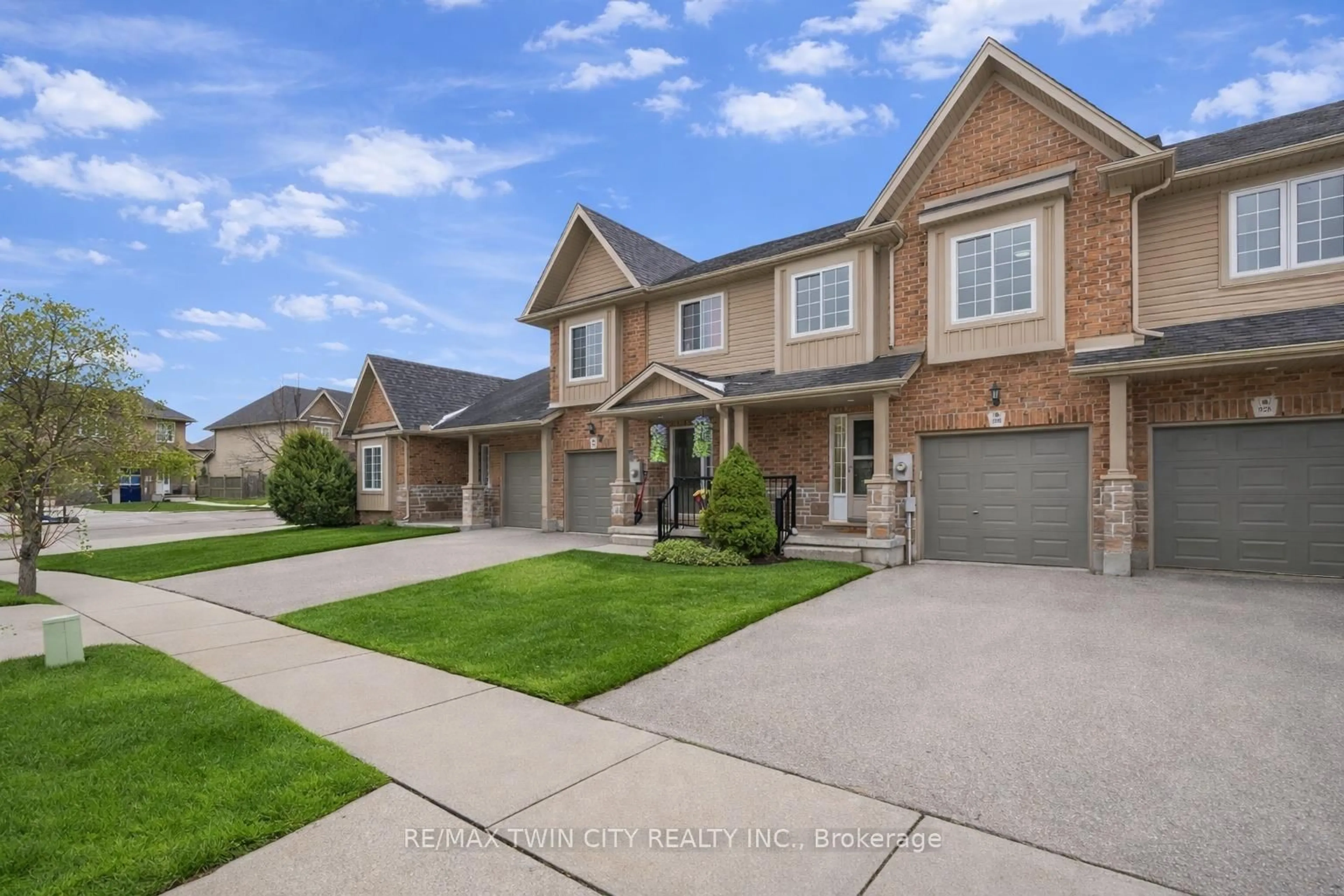 Home with brick exterior material, street for 930 Zeller Cres, Kitchener Ontario N2A 0C7