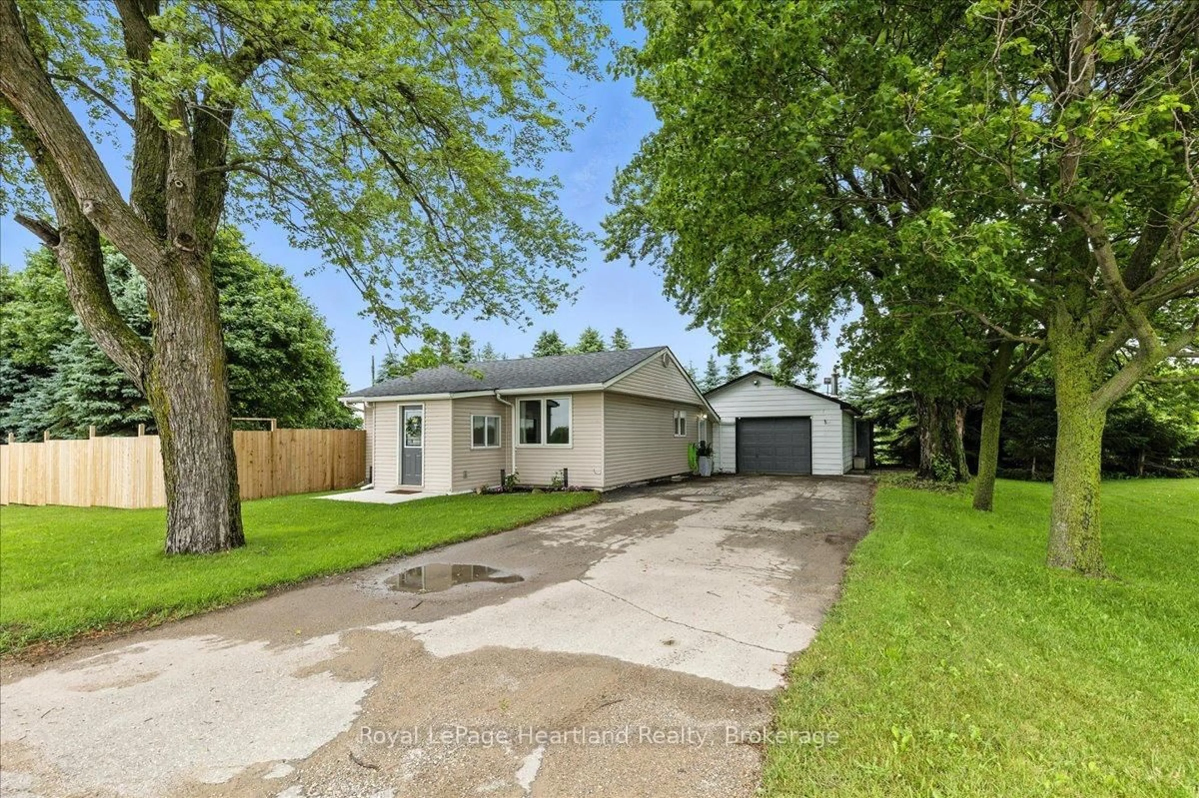 A pic from outside/outdoor area/front of a property/back of a property/a pic from drone, street for 7637 Wellington Road 7, Mapleton Ontario N0B 1A0