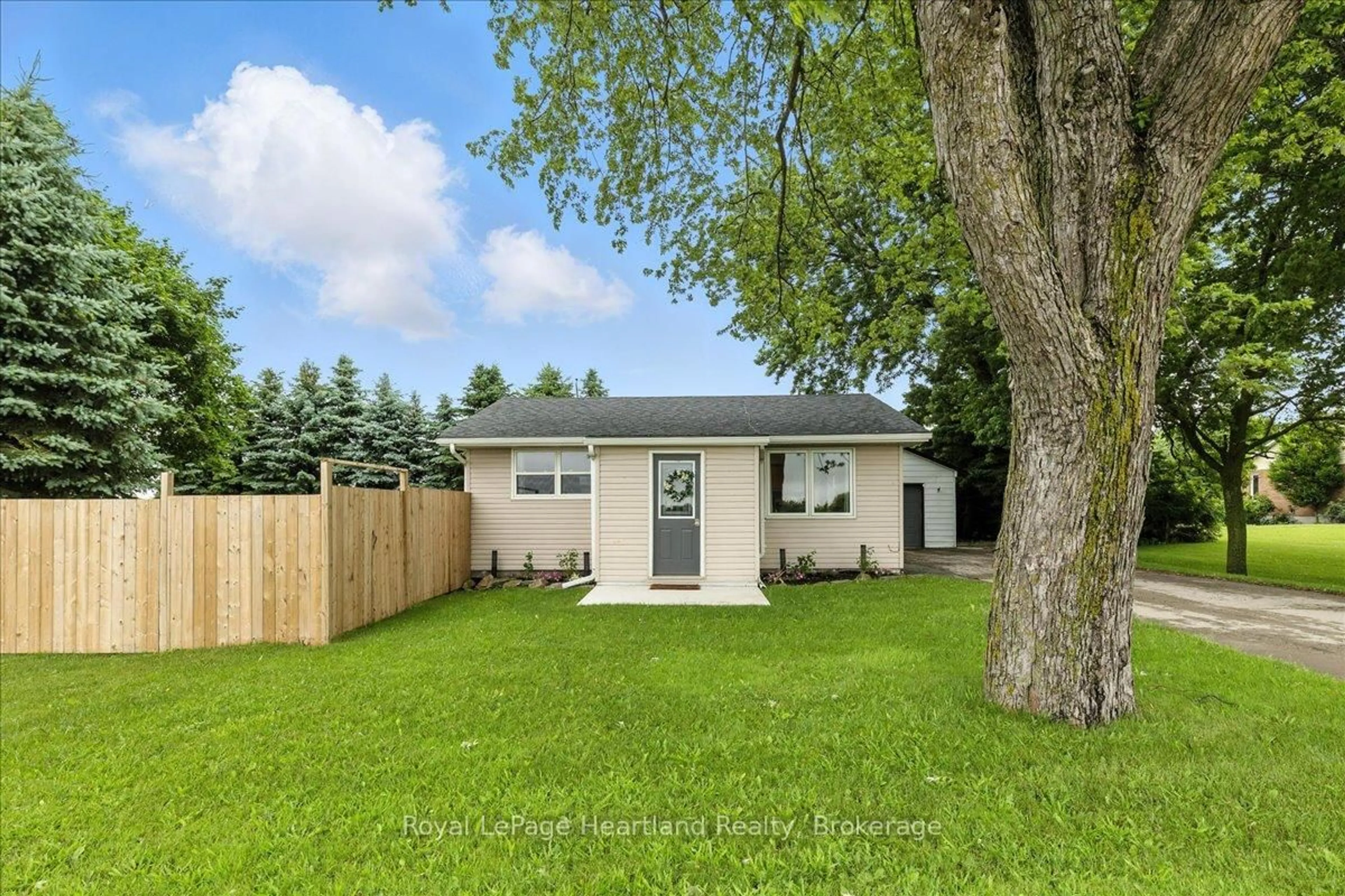 Home with vinyl exterior material, street for 7637 Wellington Road 7, Mapleton Ontario N0B 1A0