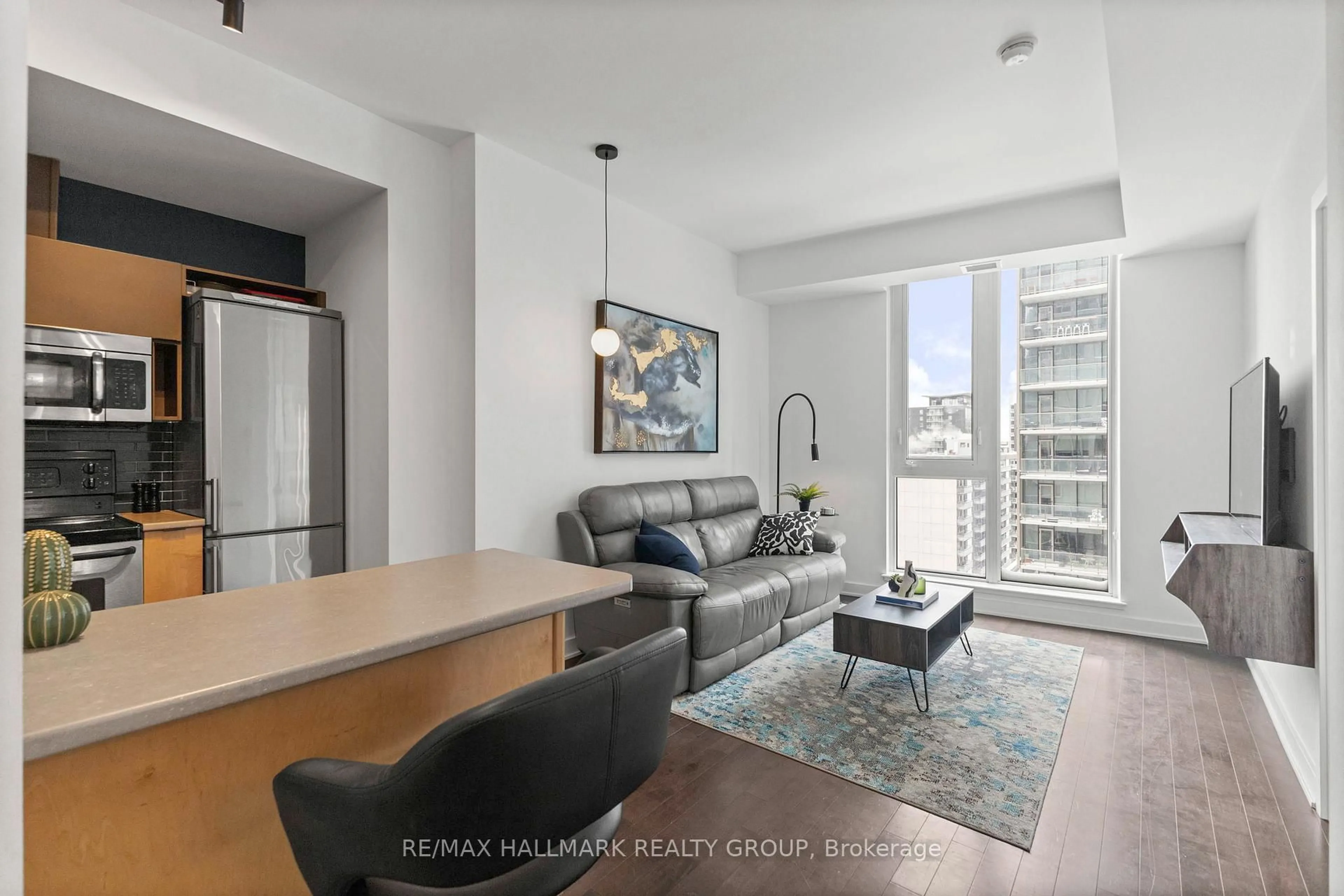 Living room with furniture, unknown for 179 Metcalfe St #1010, Ottawa Ontario K2P 1P7