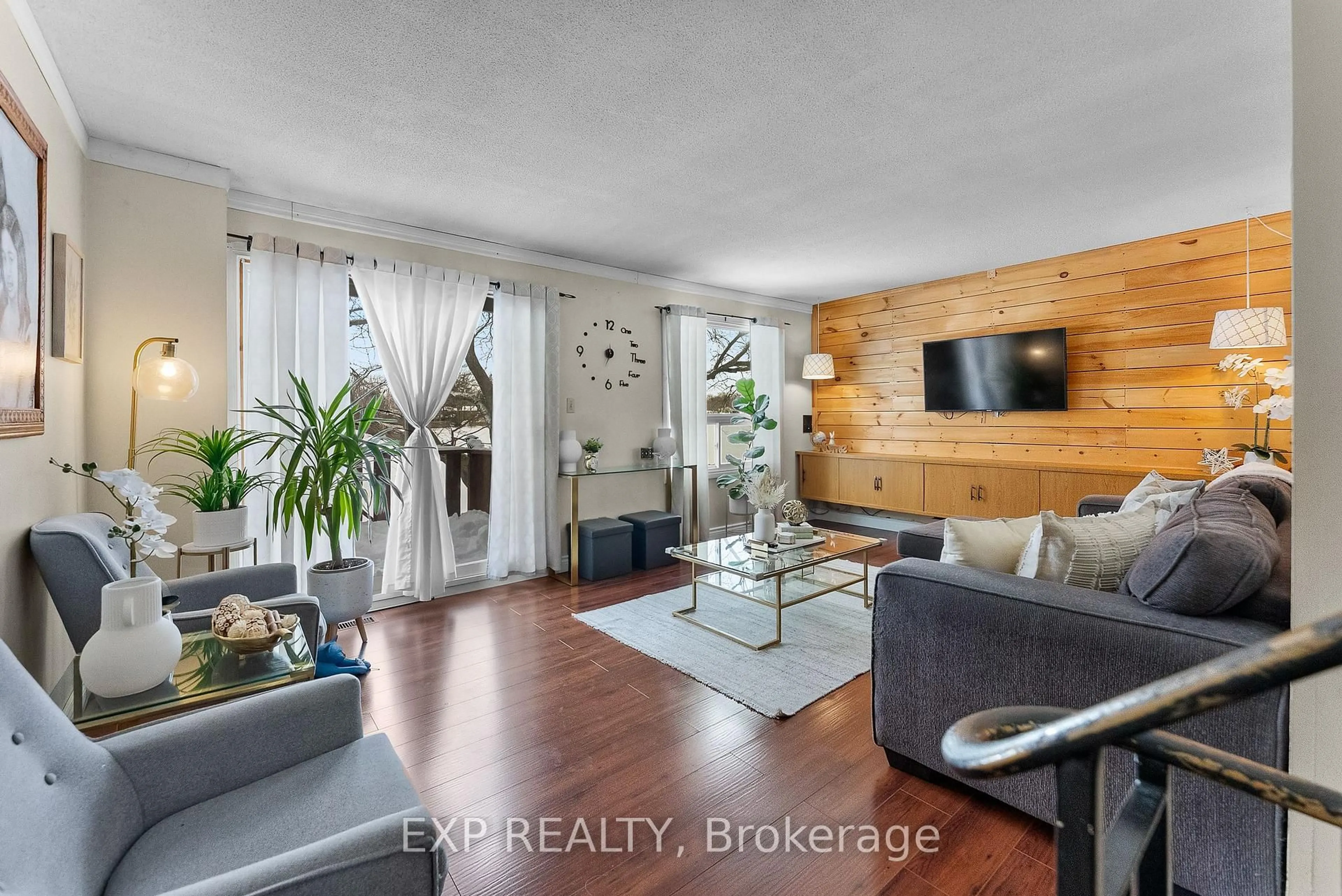 Living room with furniture, wood/laminate floor for 7001 Casey St #29, Niagara Falls Ontario L2J 3G6